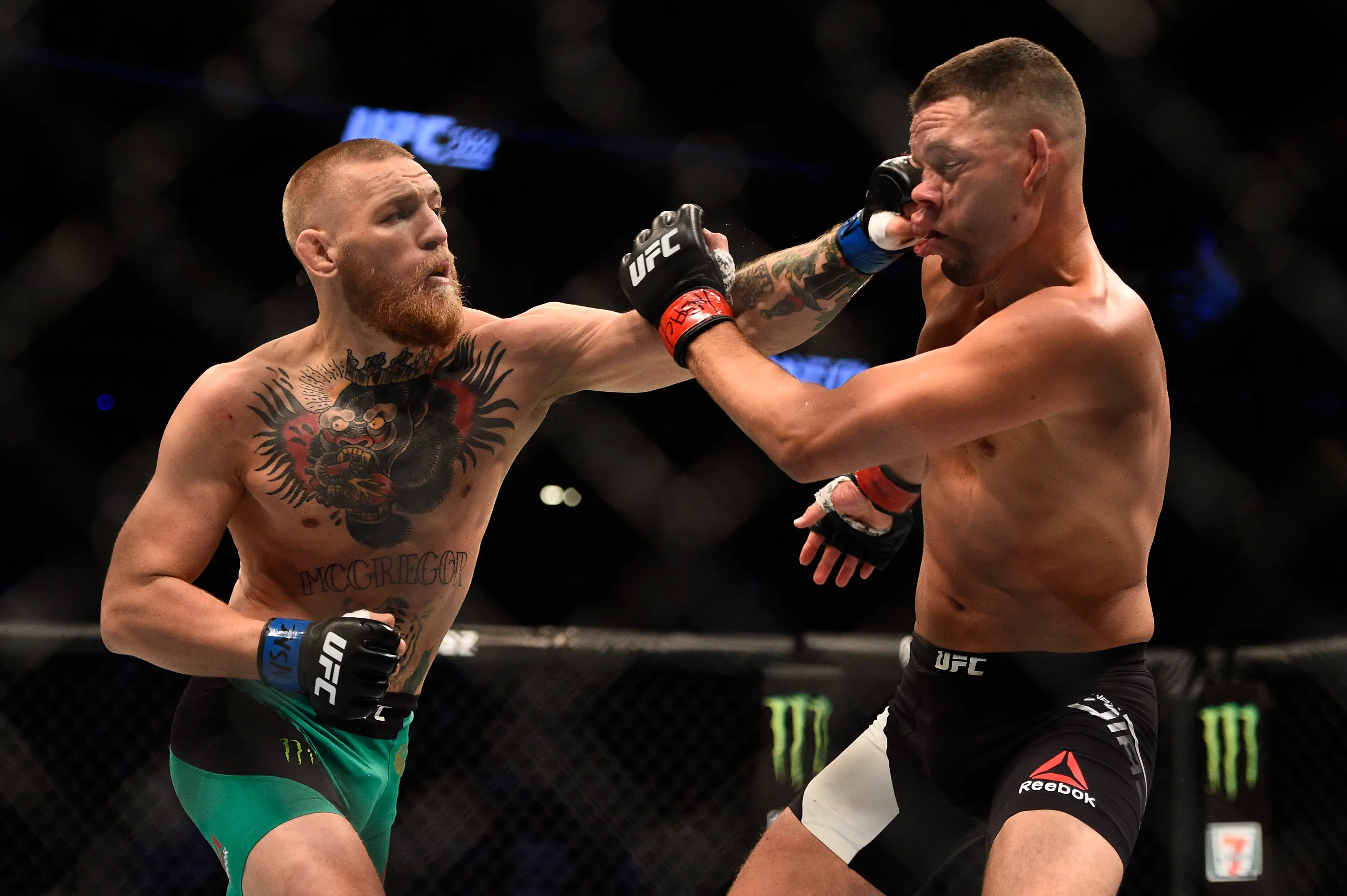 Conor McGregor and Nate Diaz during their rematch at UFC 202. Image: Getty 