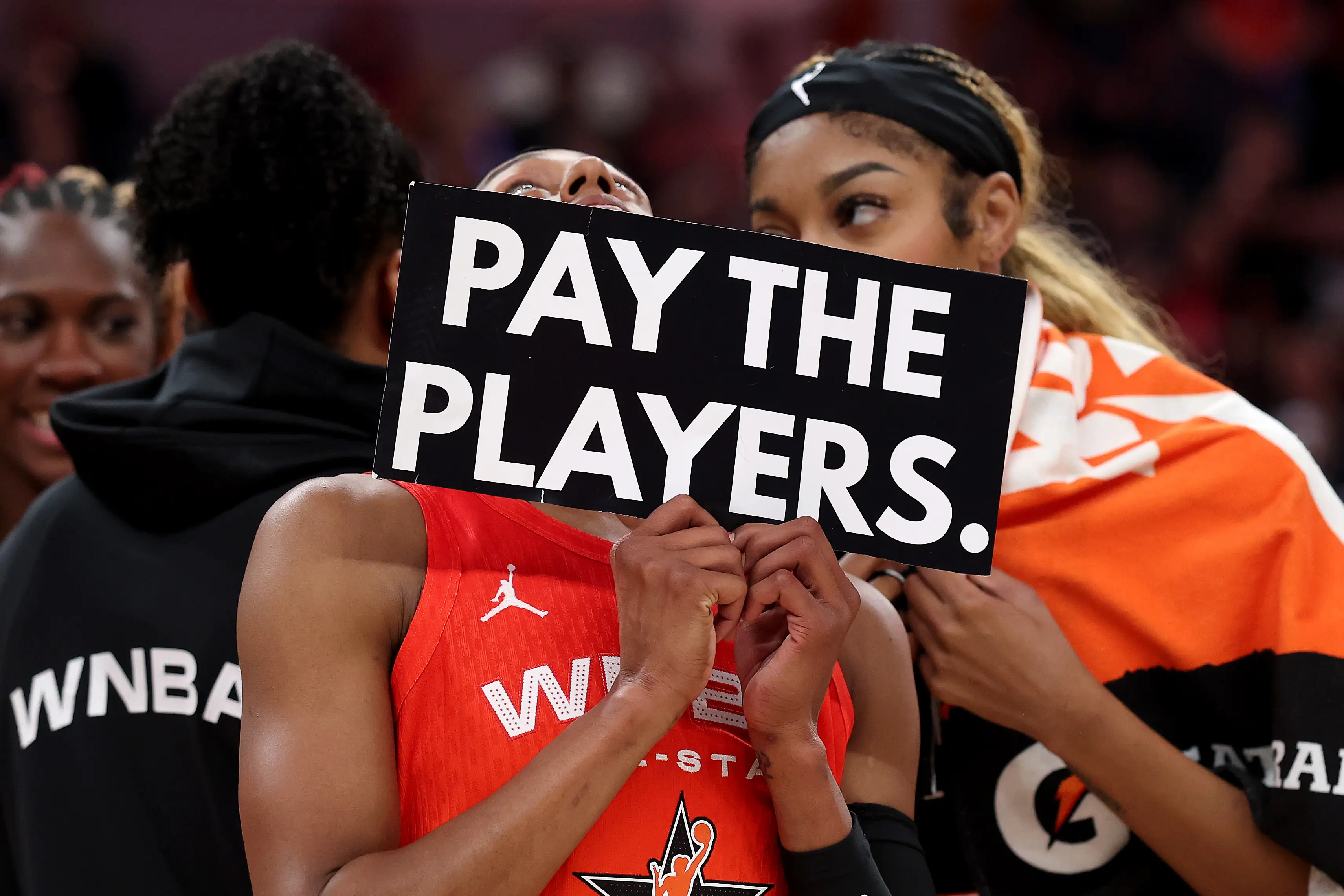 Angel Reese and Brittney Sykes have protested their pay. (Image: Steph Chambers / Staff via Getty)