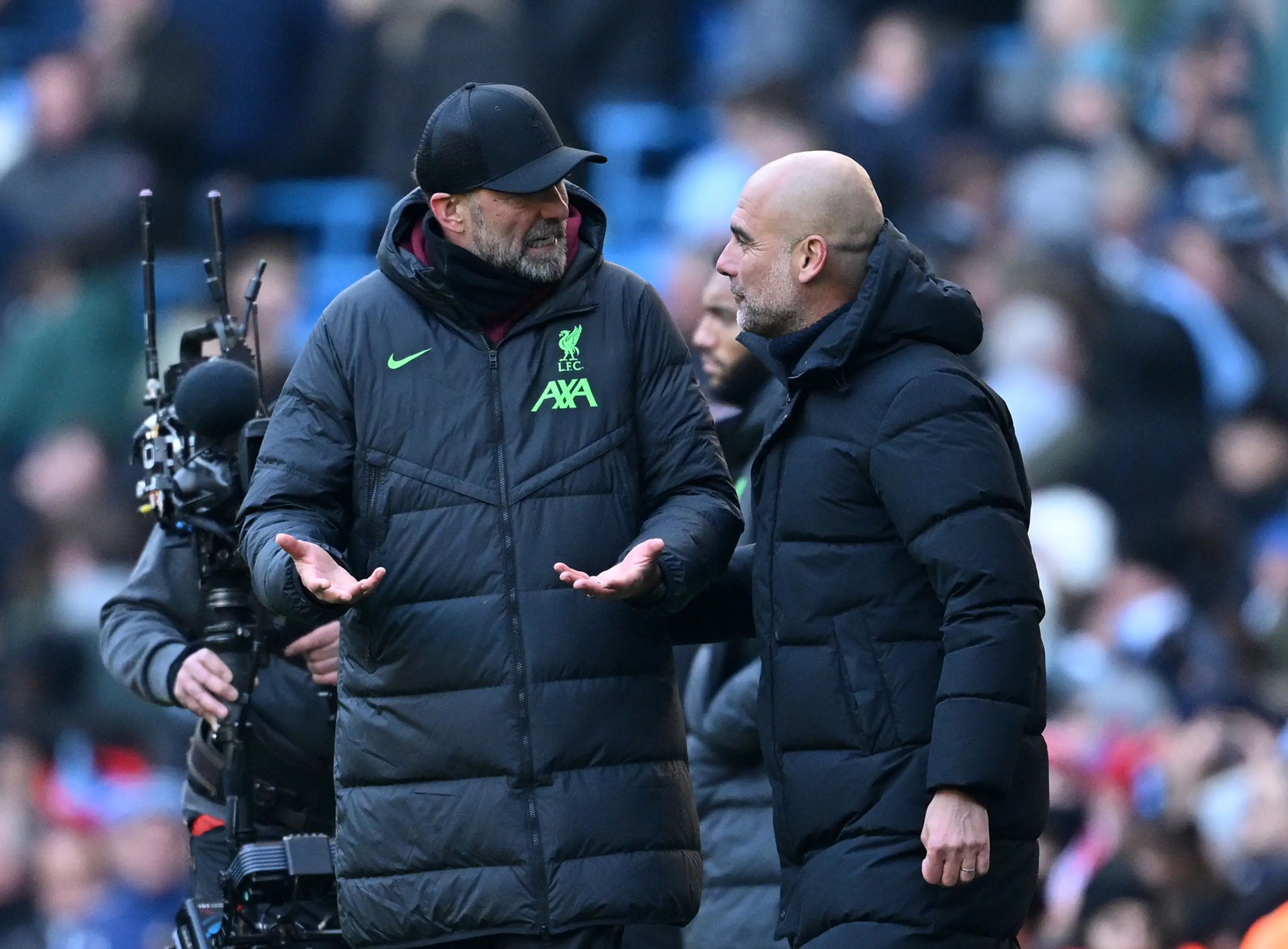 Liverpool's Jurgen Klopp and Manchester City's Pep Guardiola. (