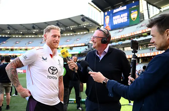 TMS commentator Jonathan Agnew interviews England captain Ben Stokes in Melbourne (Image: Getty)