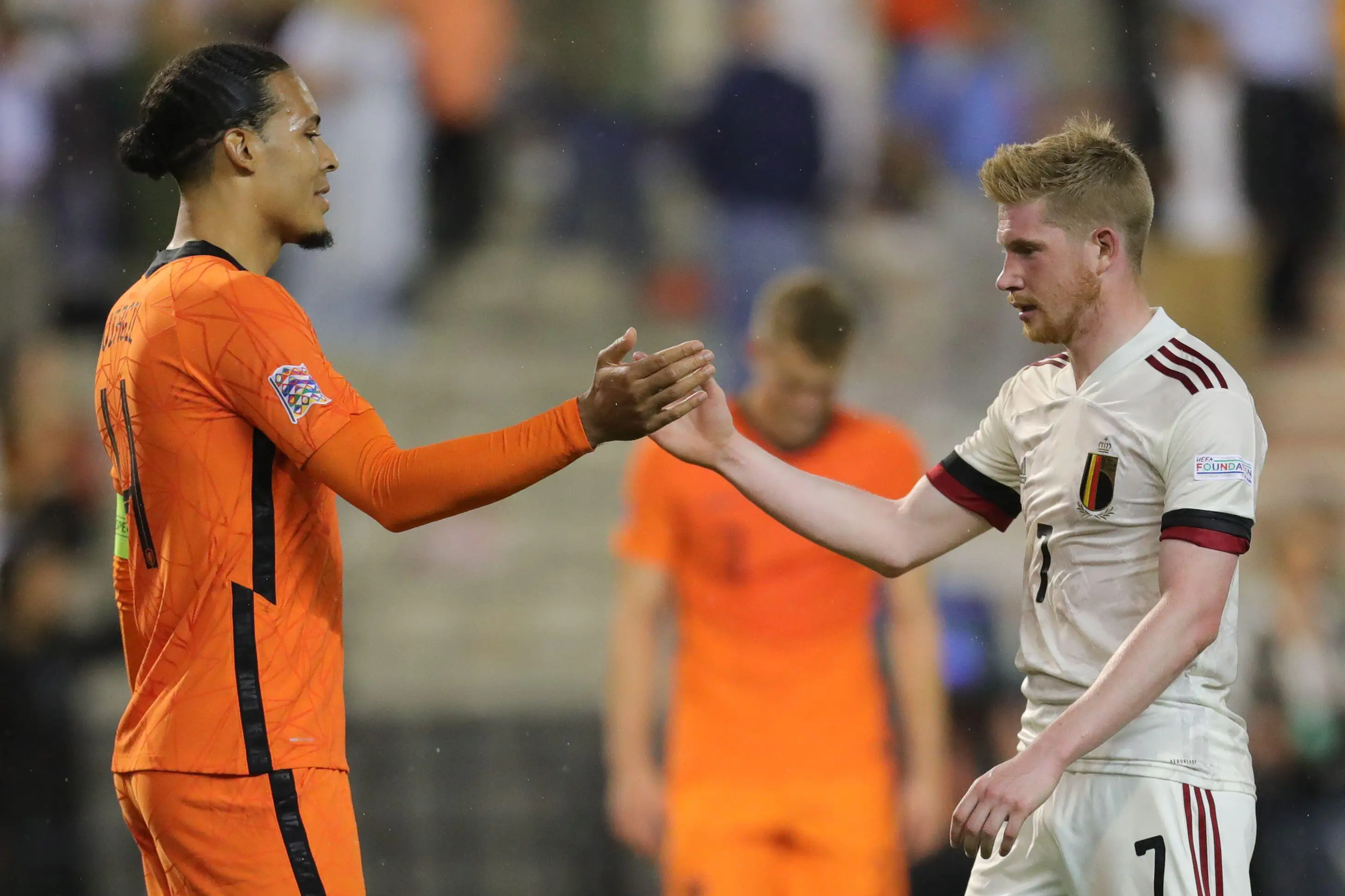 Kevin De Bruyne and Virgil Van Dijk. Xinhua / Alamy