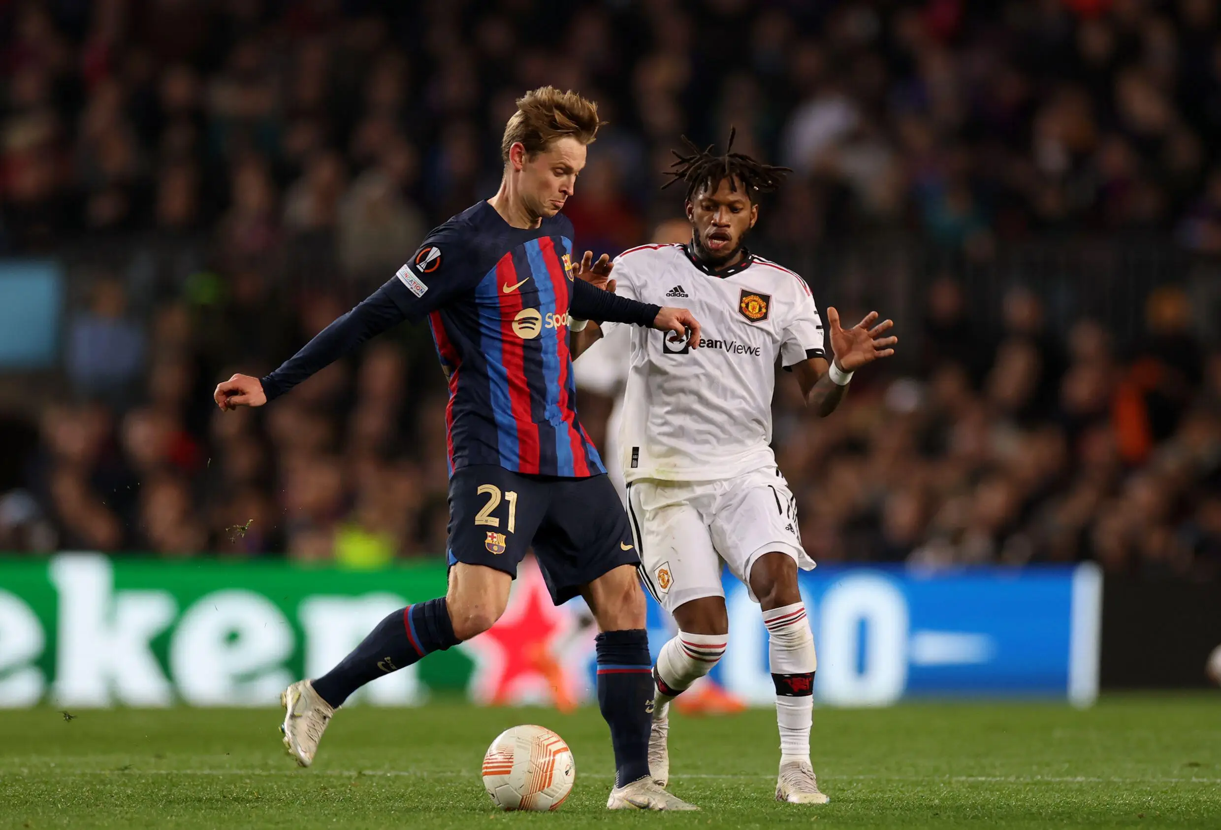 Frenkie de Jong and Fred battle for the ball. Image: Alamy