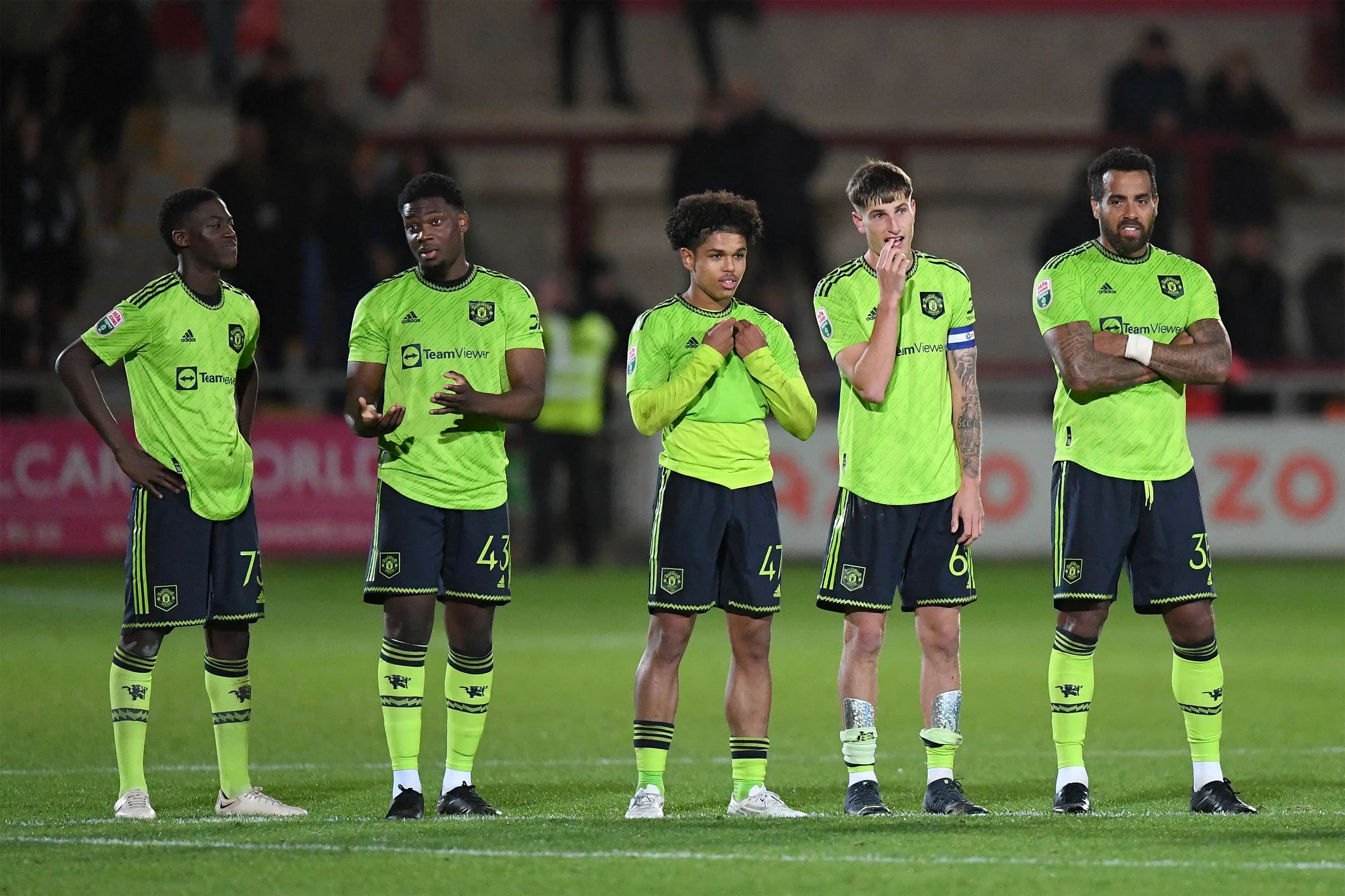 Kobbie Mainoo [far left] and Tom Huddlestone [far right] during an U21 clash against Fleetwood. Image credit: Getty 