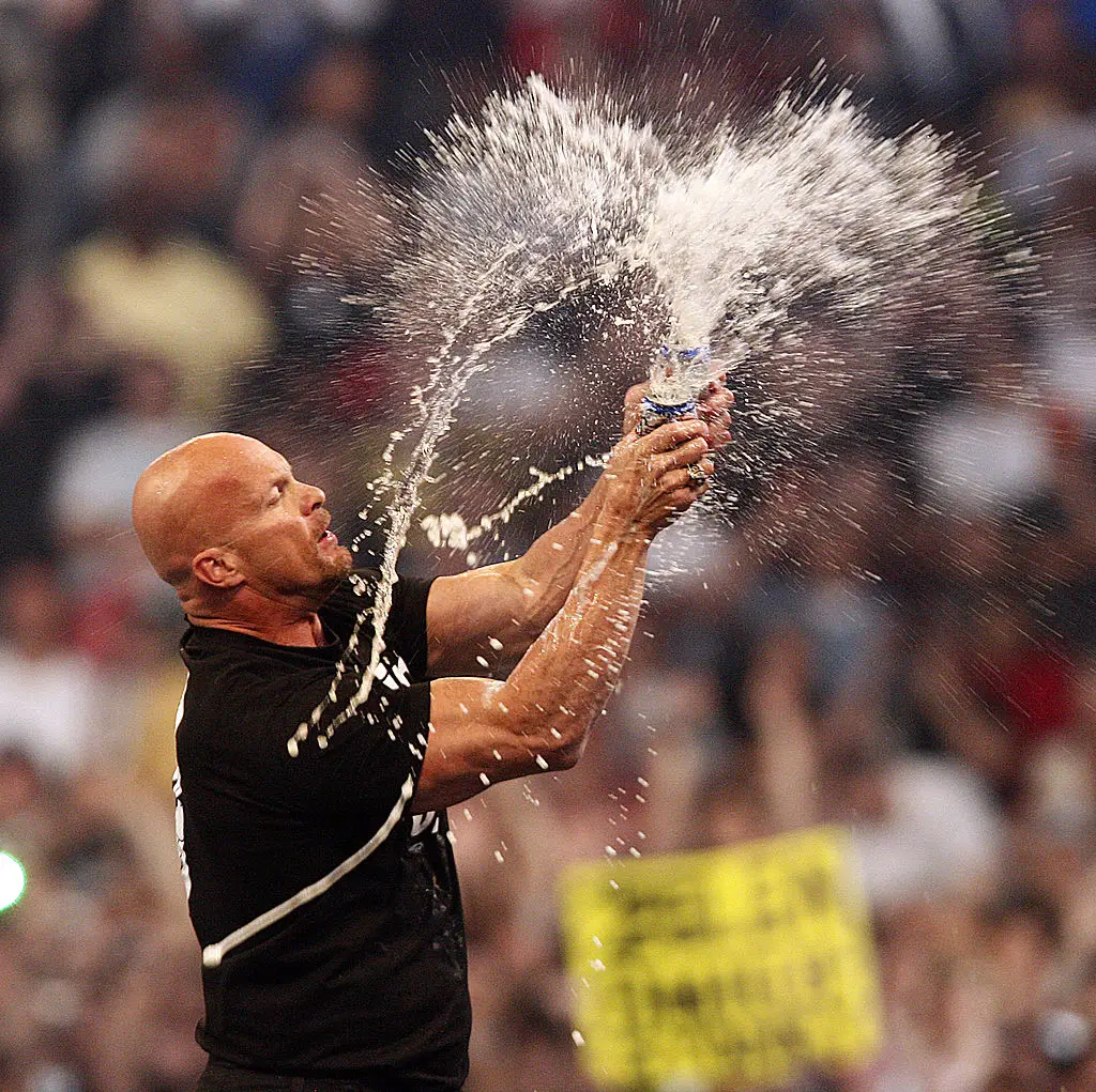 'Stone Cold' Steve Austin was infamous for drinking beer during and after his matches - Getty
