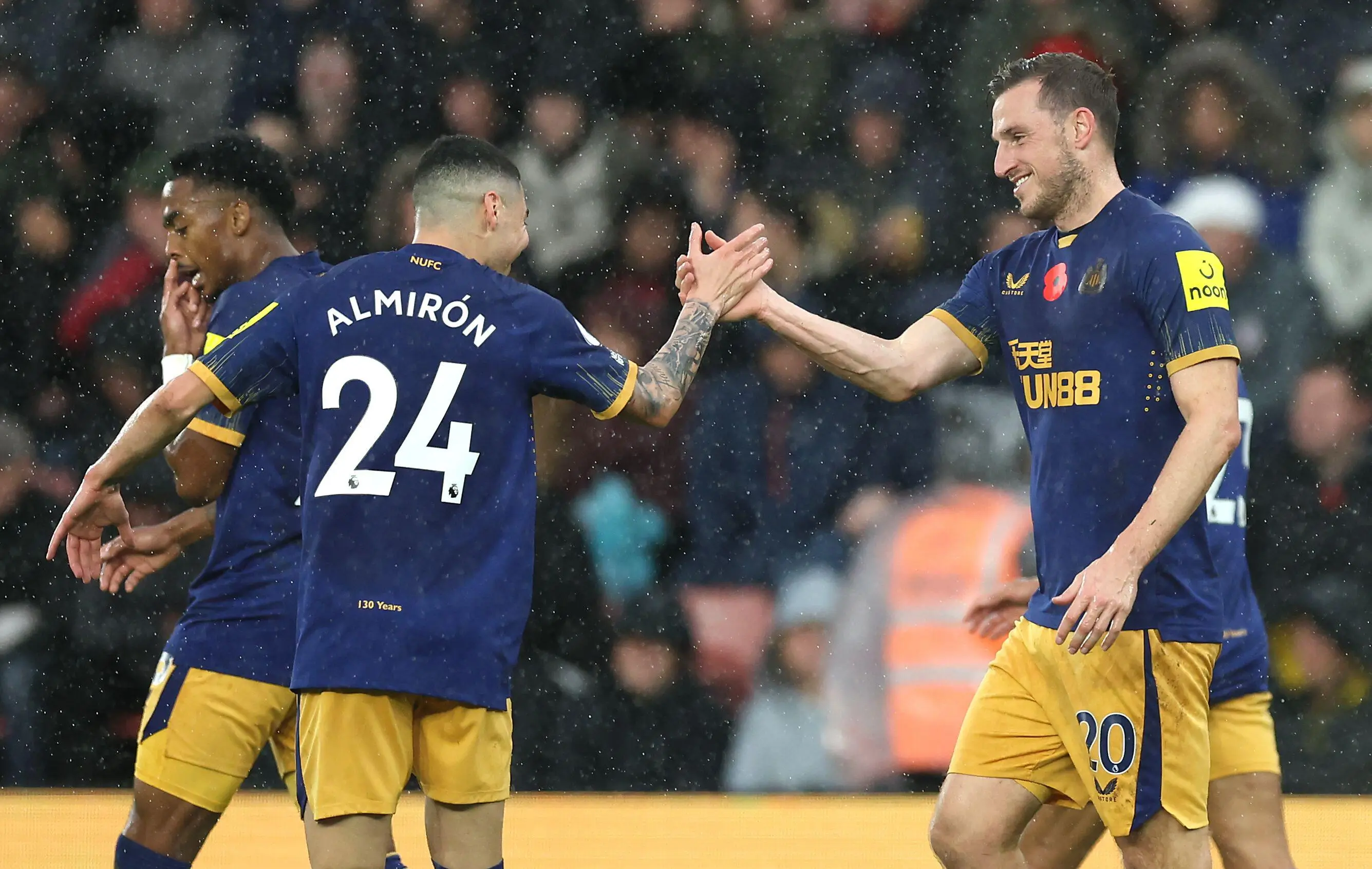 Newcastle United's Chris Wood (right) celebrates scoring their side's second goal of the game with team-mate Miguel Almiron during the Premier League match at St. Mary's Stadium. (Alamy)