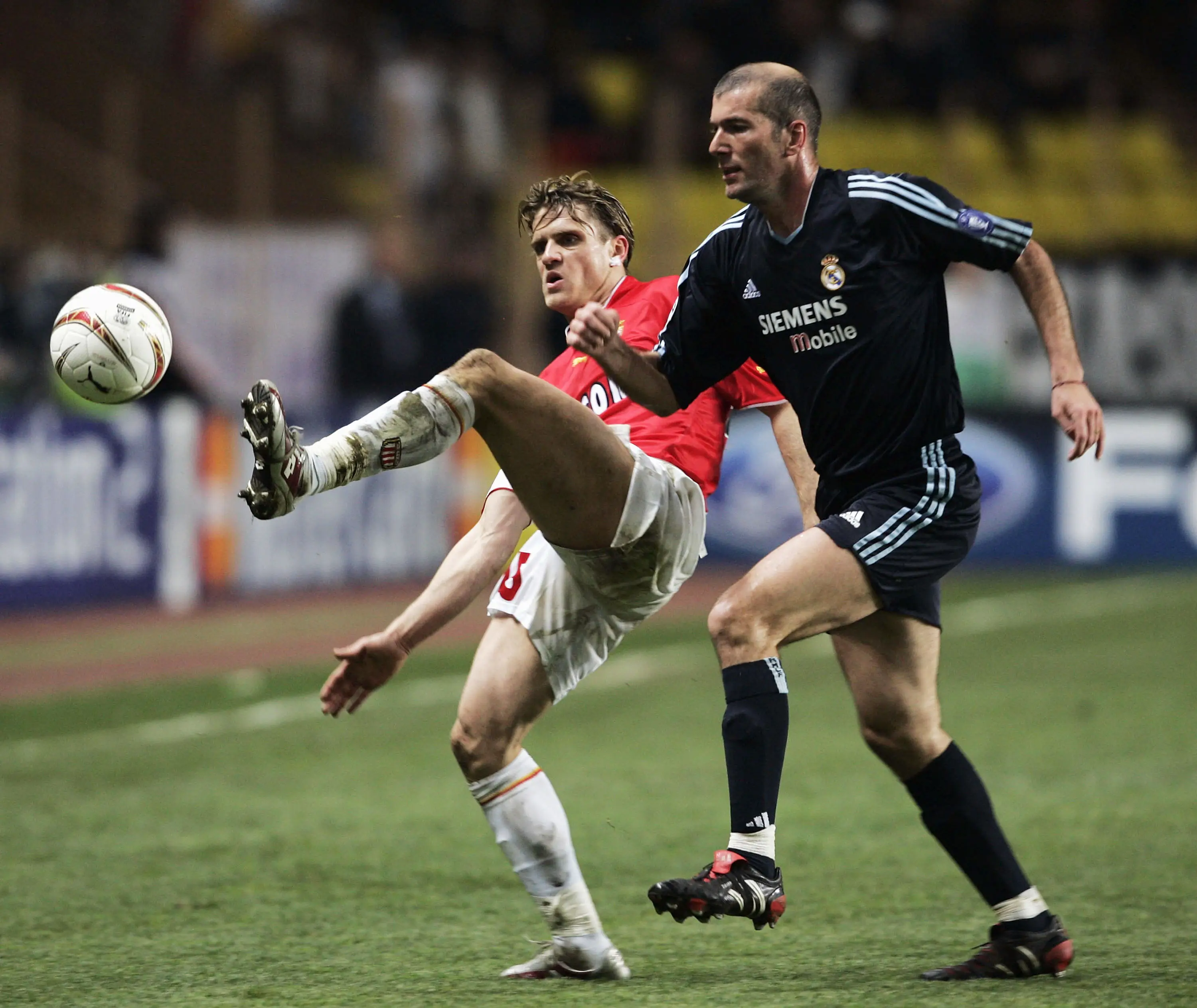 Zinedine Zidane and Jerome Rothen in the Champions League quarter-final (Image: Getty)