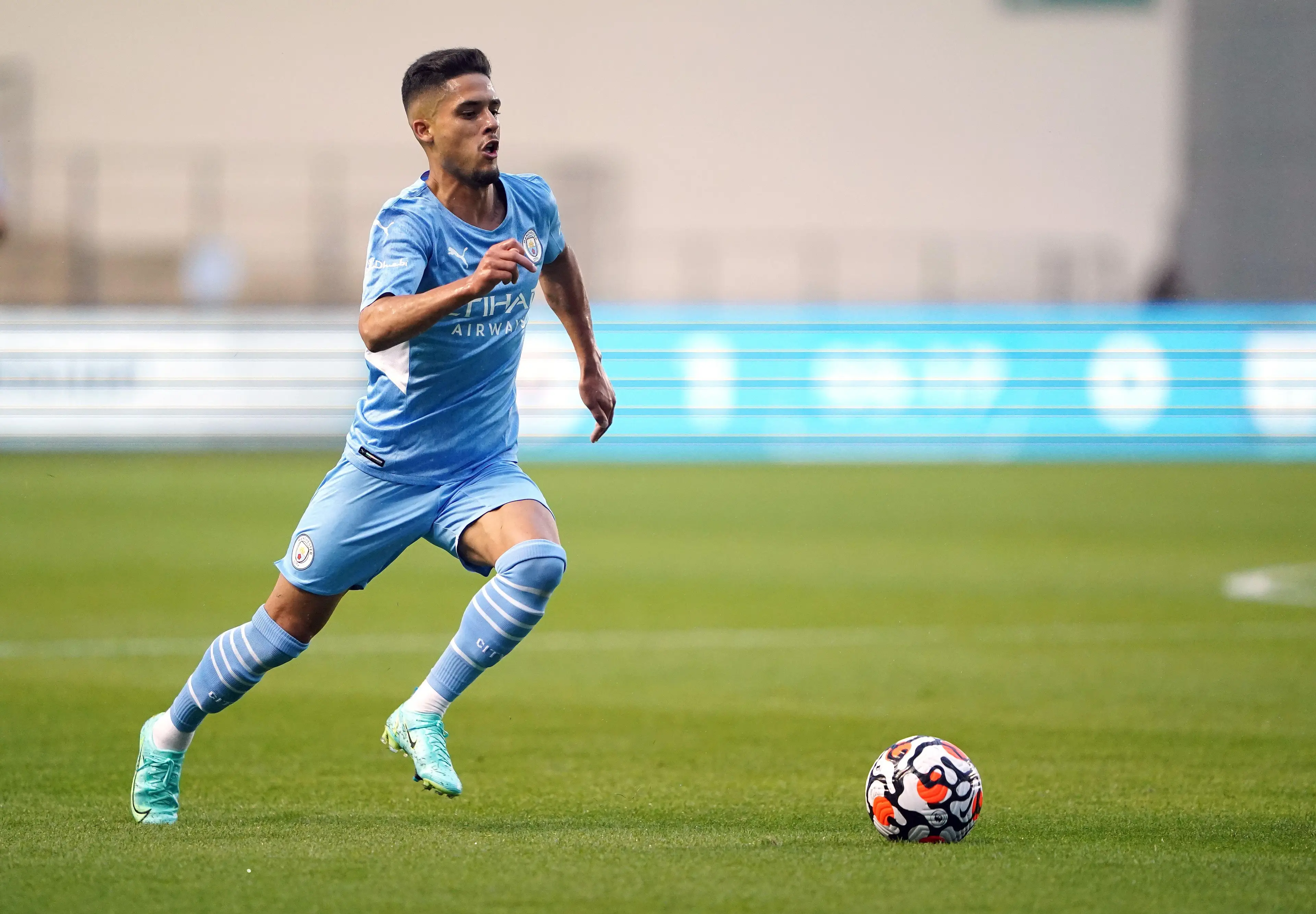 Yan Couto in action for Manchester City. PA Images / Alamy