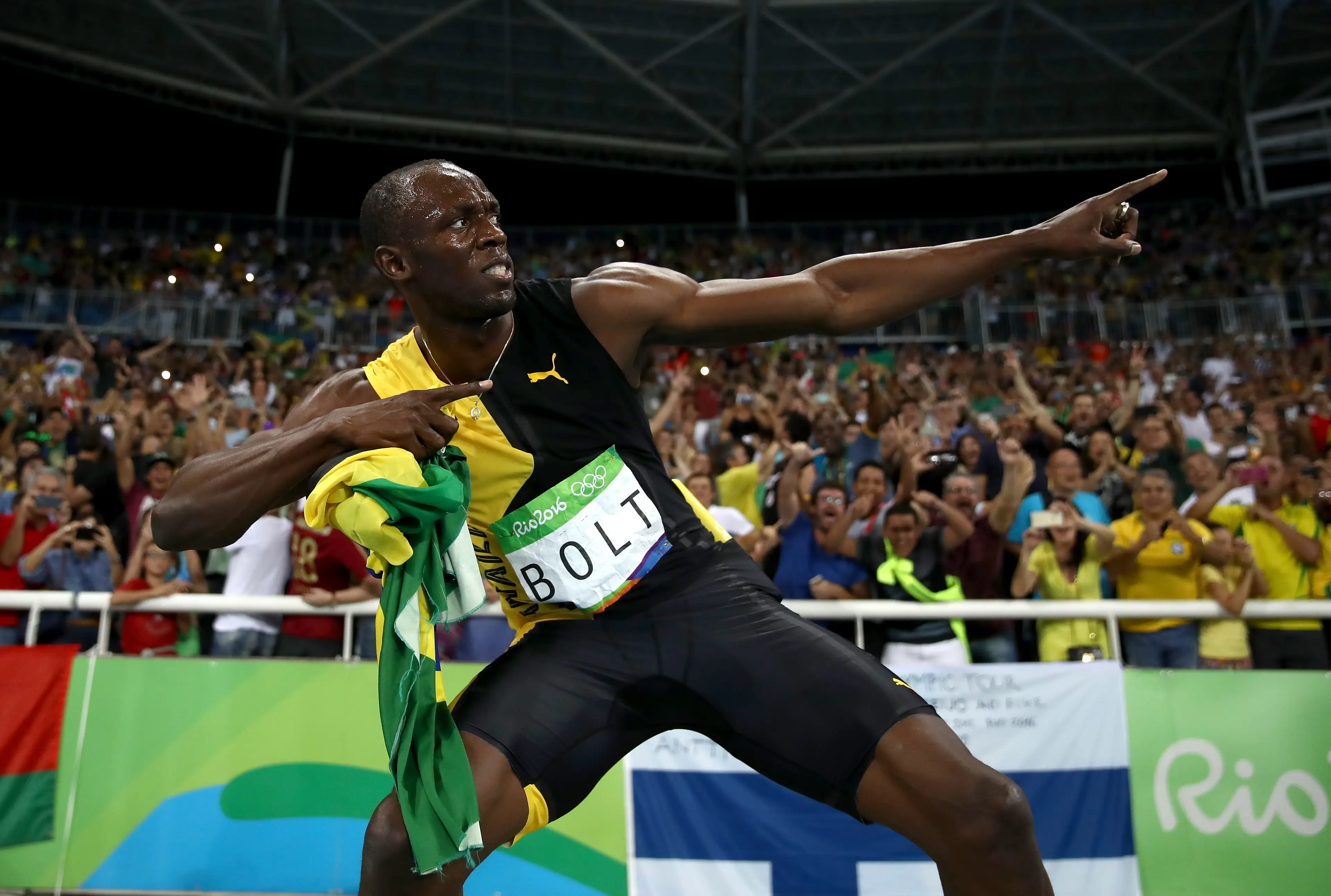 Usain Bolt celebrates after winning the 4x100m relay at the 2016 Olympics. Image: Getty