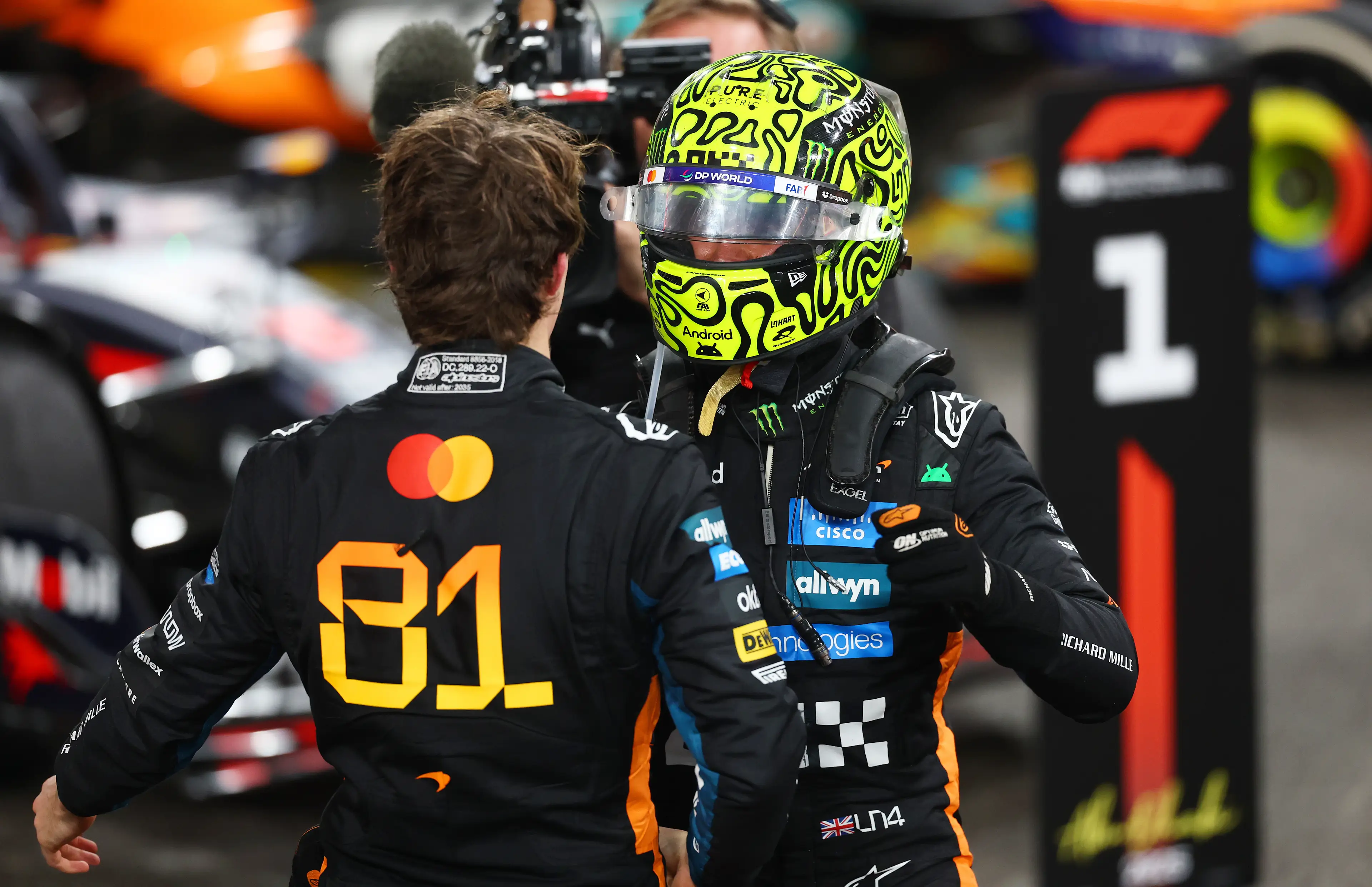 Oscar Piastri and Lando Norris share an embrace at the Abu Dhabi Grand Prix. Image: Getty 