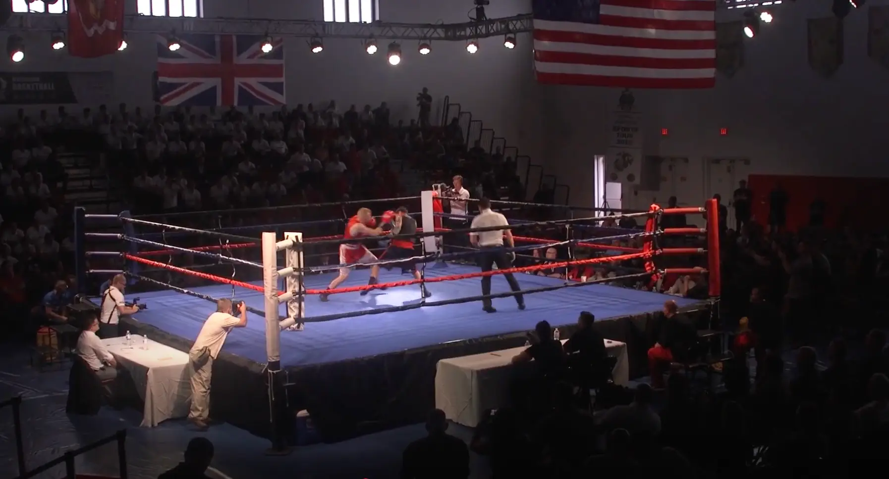 An action shot of the boxing event pitting the USMC against the British marines. Image: YouTube/U.S. Forces Fitness