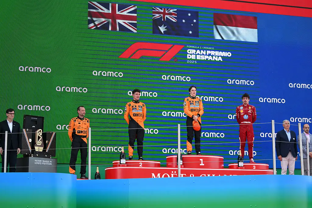 The 2025 Barcelona podium, race winner Oscar Piastri, Lando Norris and Charles Leclerc