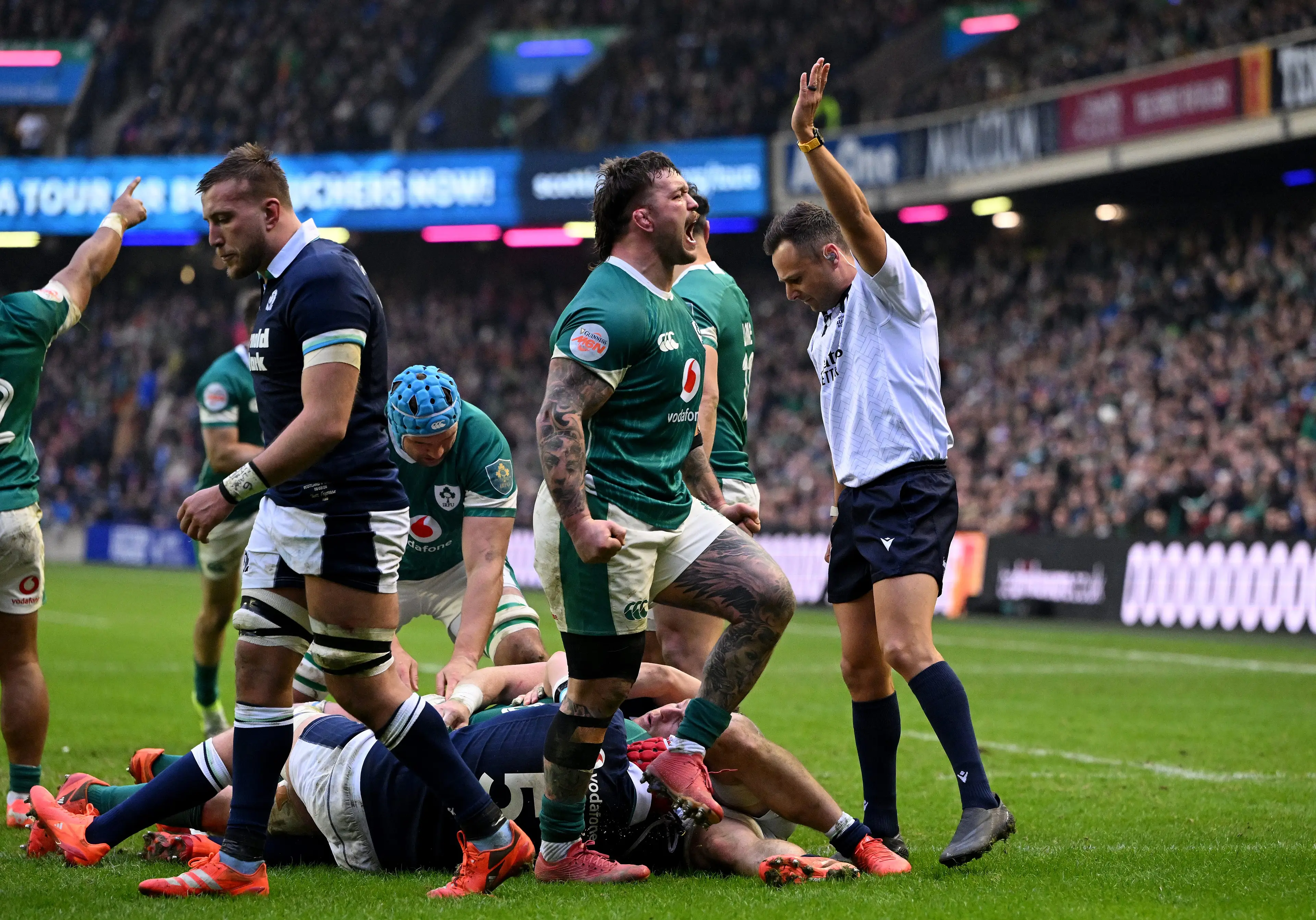 Andrew Porter of Ireland celebrates after Caelan Doris of Ireland (obscured) scores his team's second try during the Guinness Six Nations 2025 match between Scotland and Ireland (Getty Images)