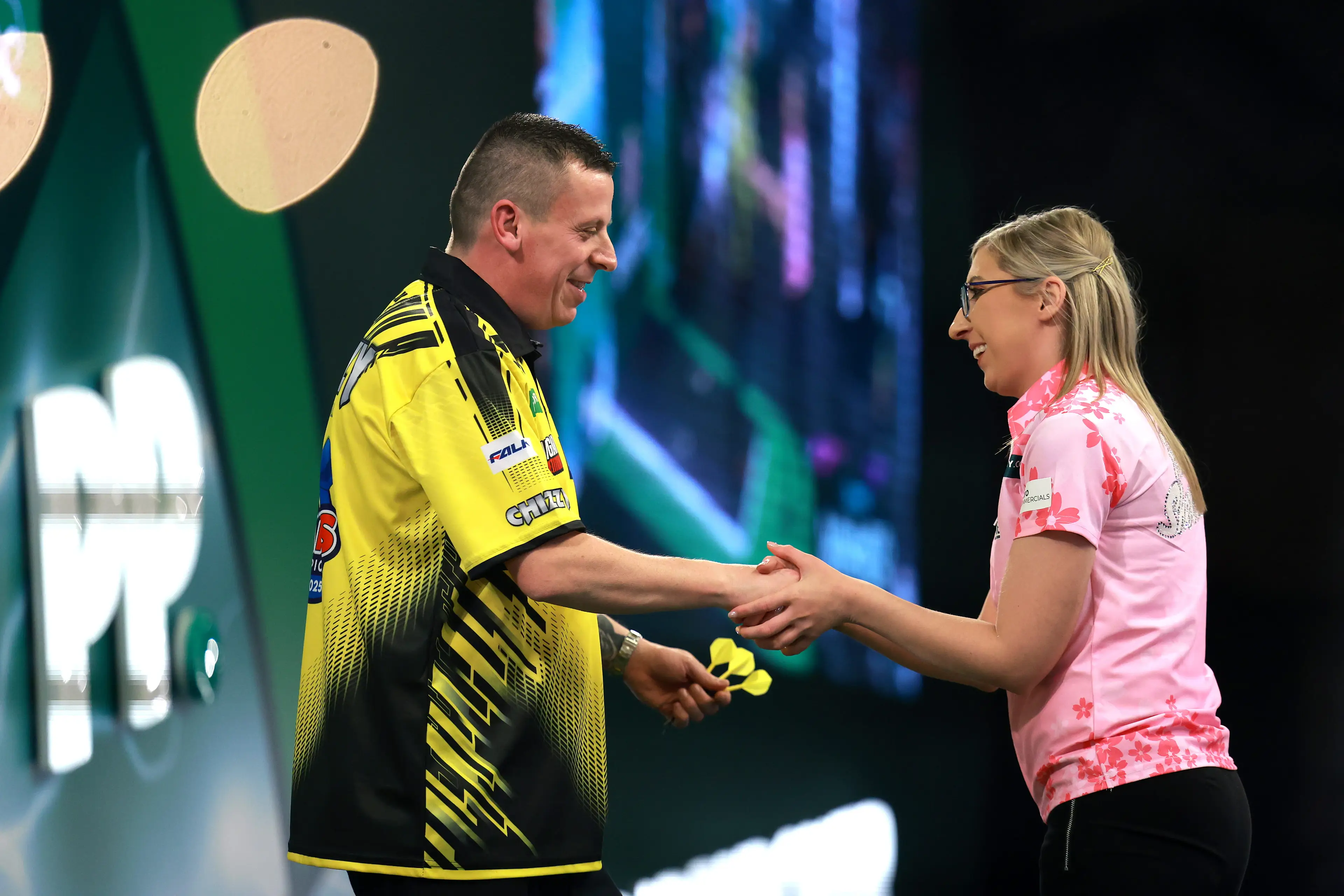 Sherrock was drawn against Dave Chisnall in round one of the 2026 World Darts Championship (Image: Getty)
