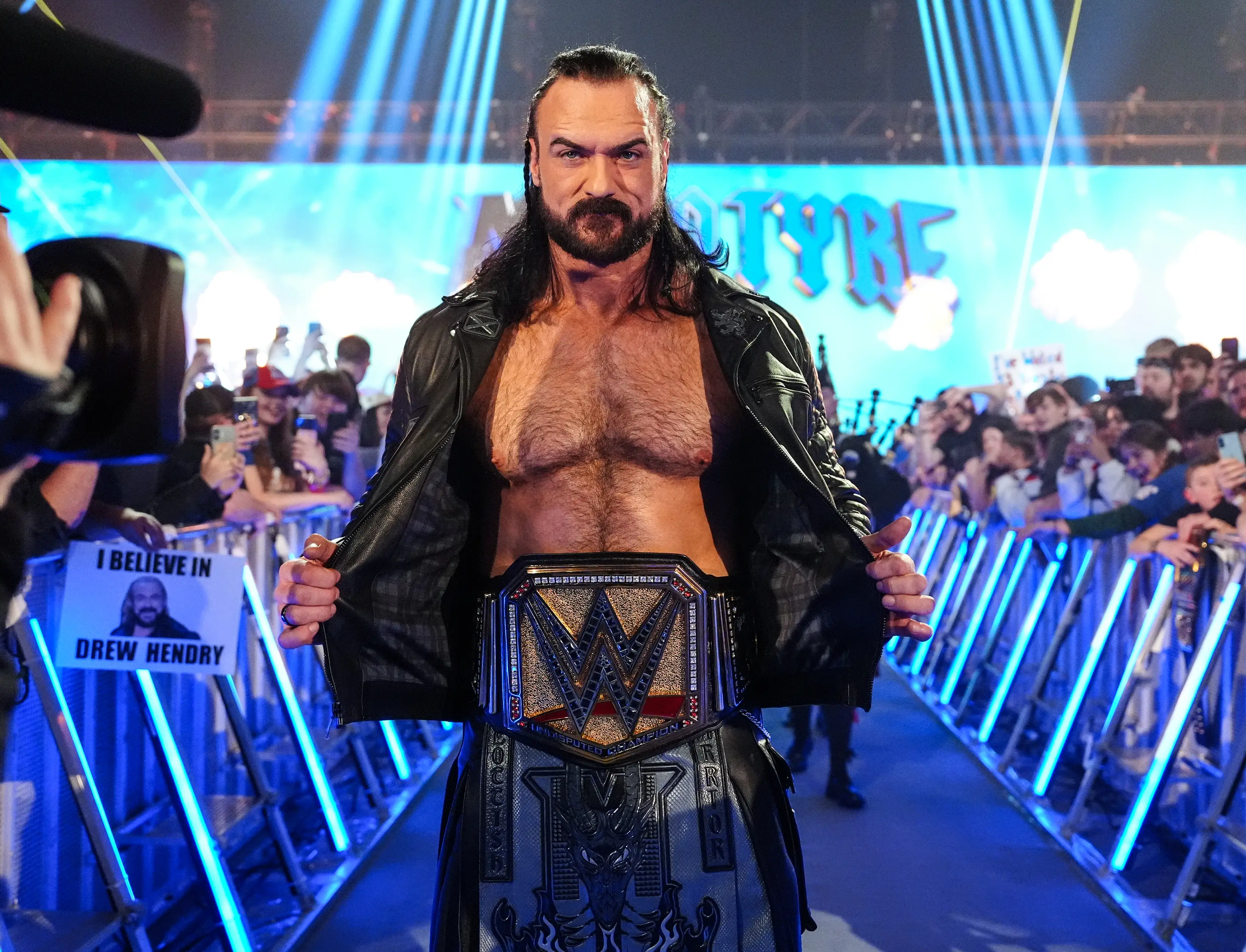 McIntyre brought his undisputedWWE title to the workout. Image: Getty