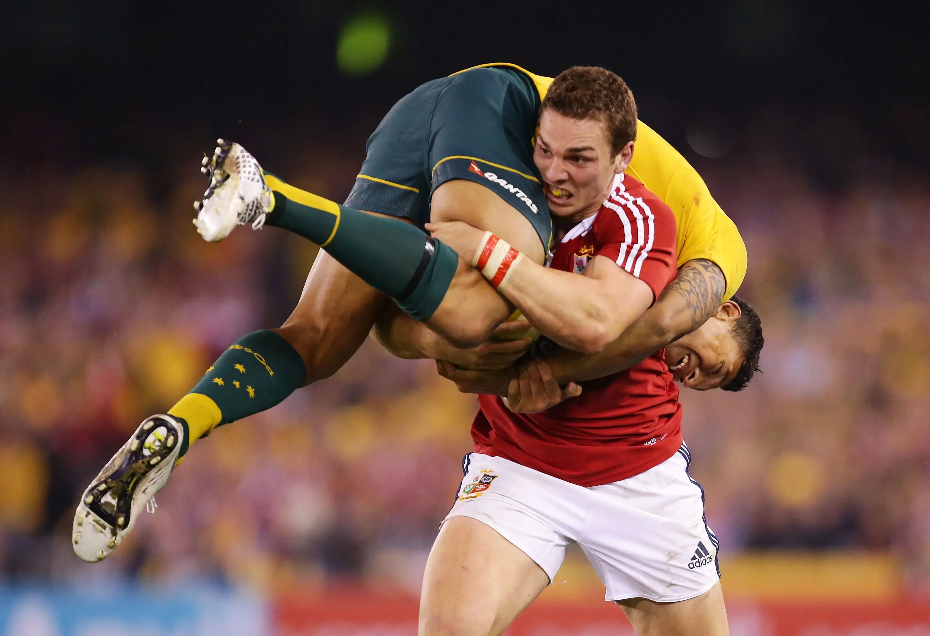  George North of the Lions lifts Israel Folau of Wallabies while carrying the ball during game two of the International Test Series between the Australian Wallabies and the British & Irish Lions (Getty Images)