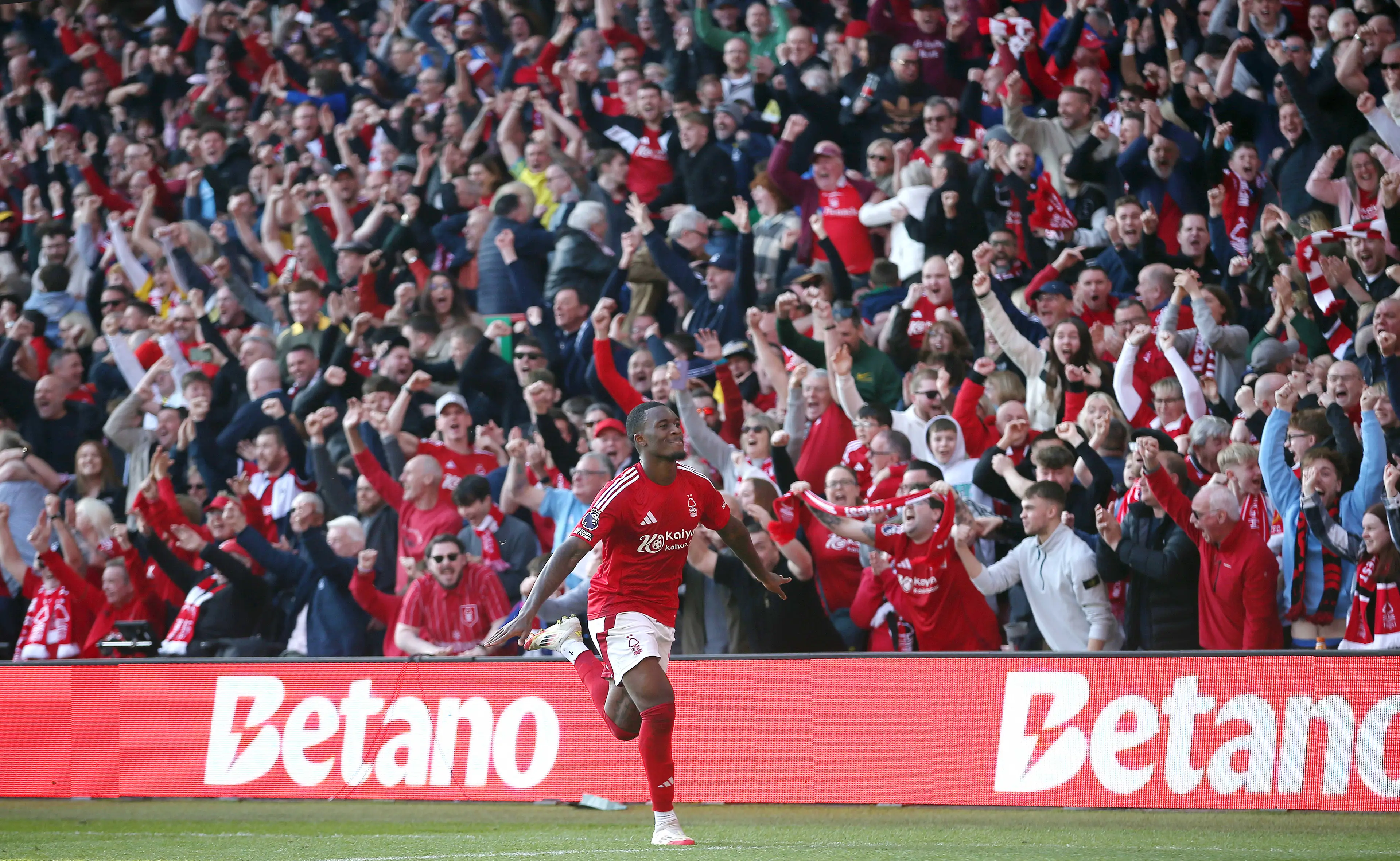 Callum Hudson-Odoi wheels away in celebration after scoring against Manchester City. Image: Getty