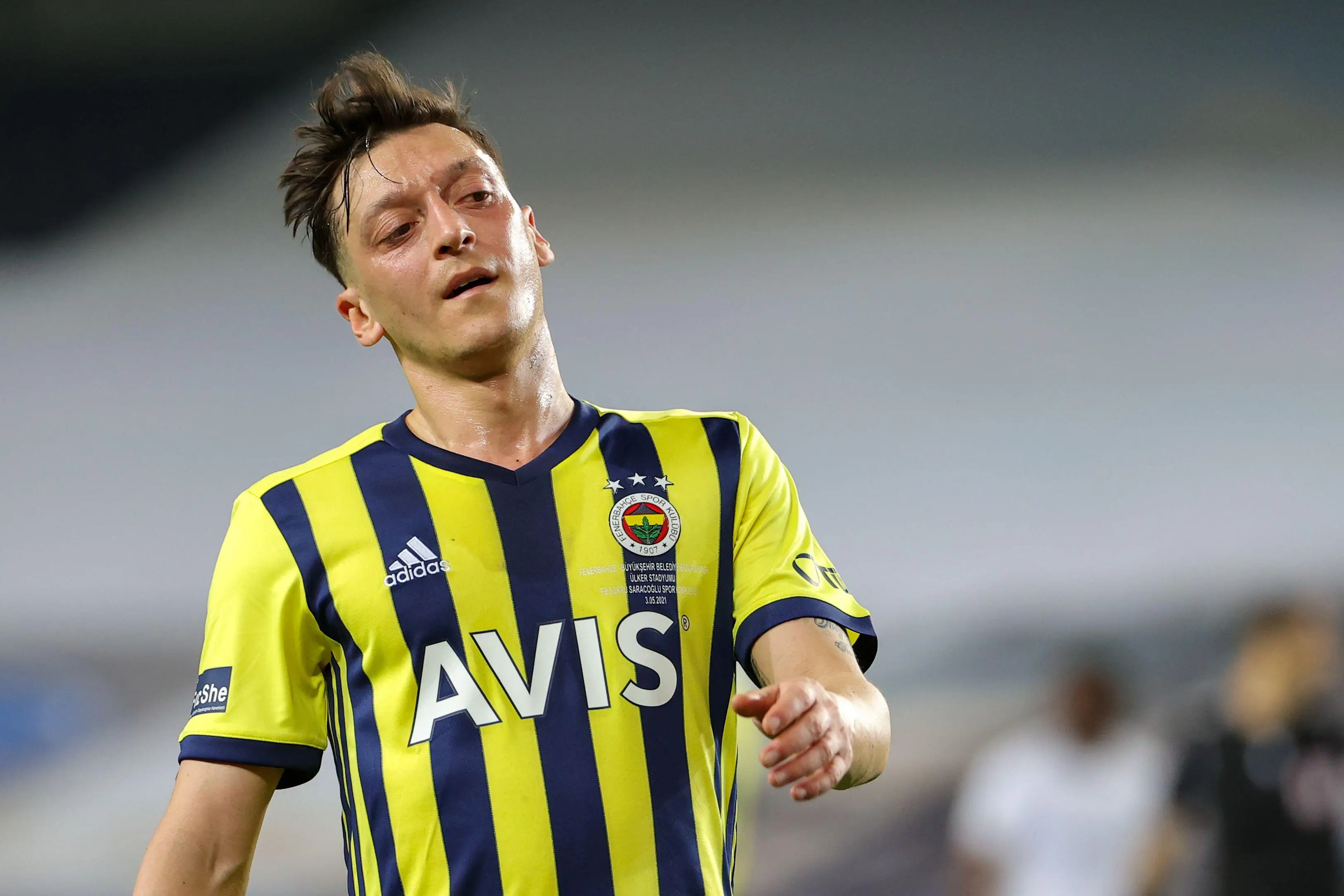 Ozil is currently suspended by Fenerbahce (Image: PA)