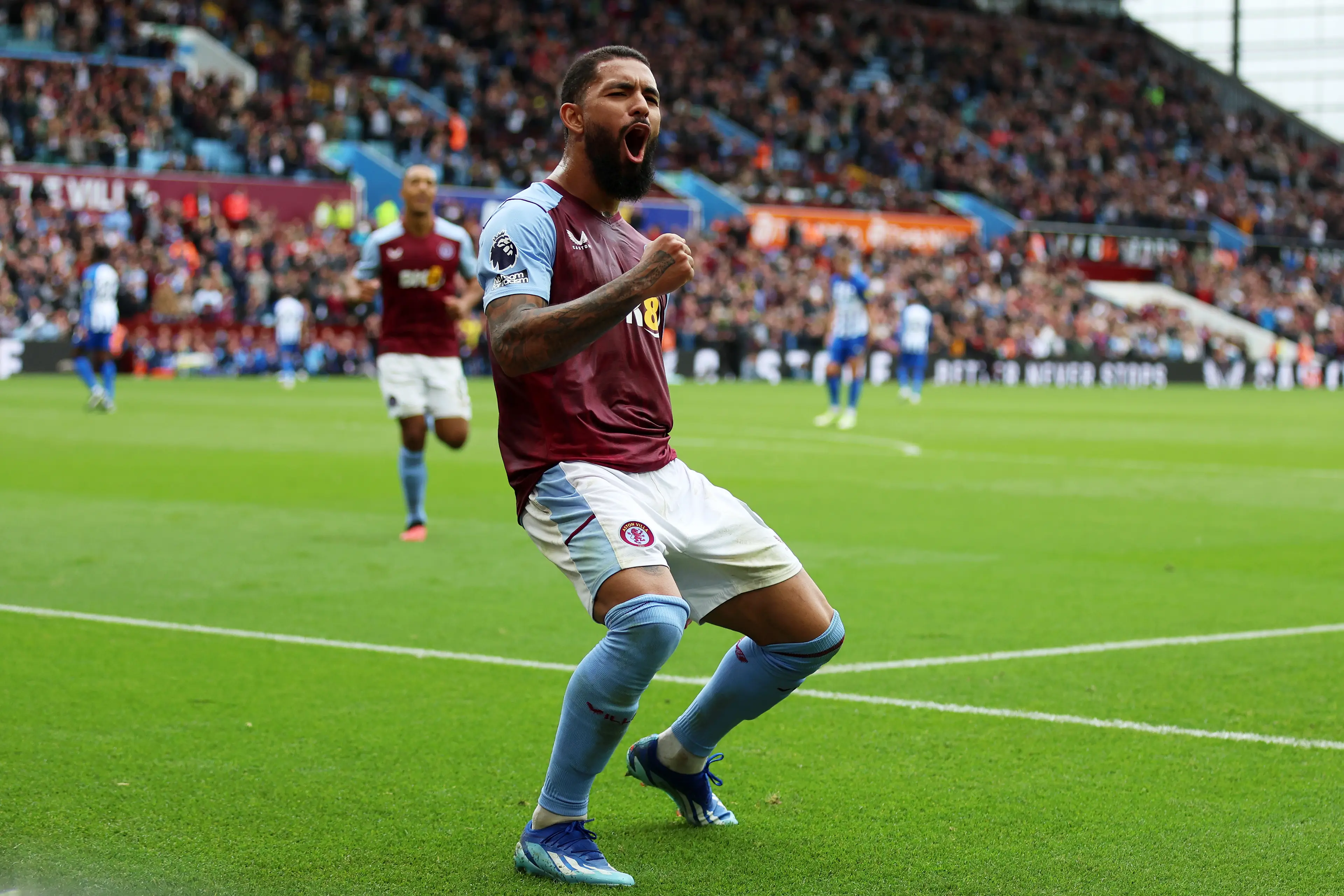 Douglas Luiz celebrates scoring a goal for Aston Villa. Image: Getty 