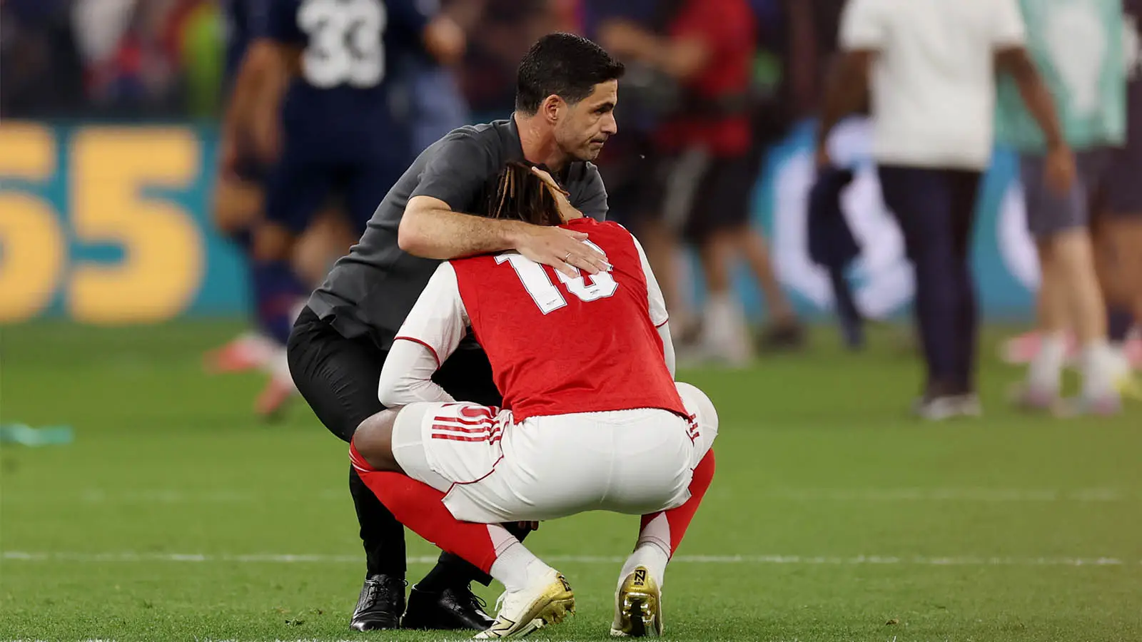 Mikel Arteta consoles Eberechi Eze after Arsenal lose the Champions League final (Image: Getty)