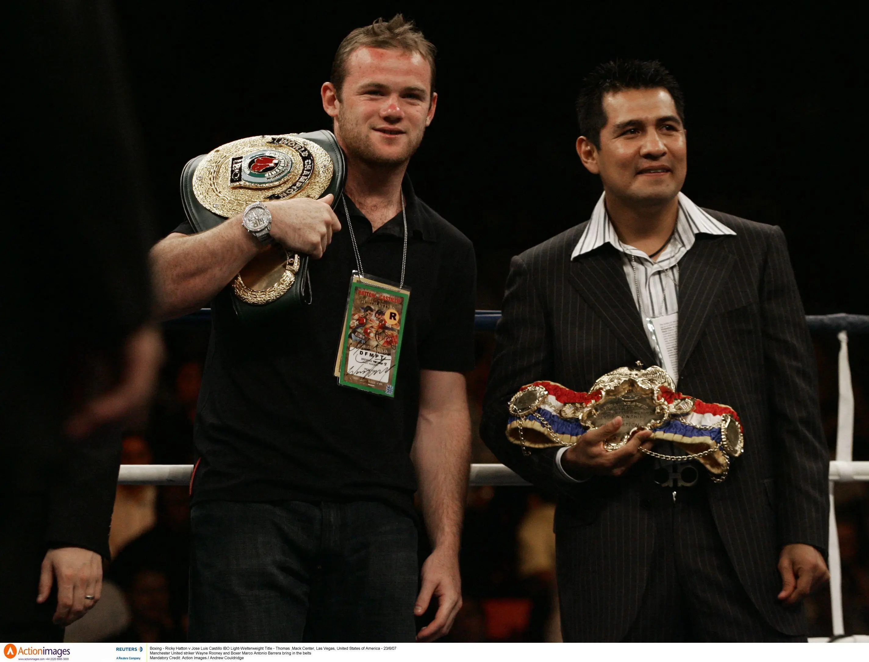 Wayne Rooney and boxer Marco Antonio Barrera bring in the belts ahead of Ricky Hatton v Jose Luis Castillo in Las Vegas. Image credit: Alamy