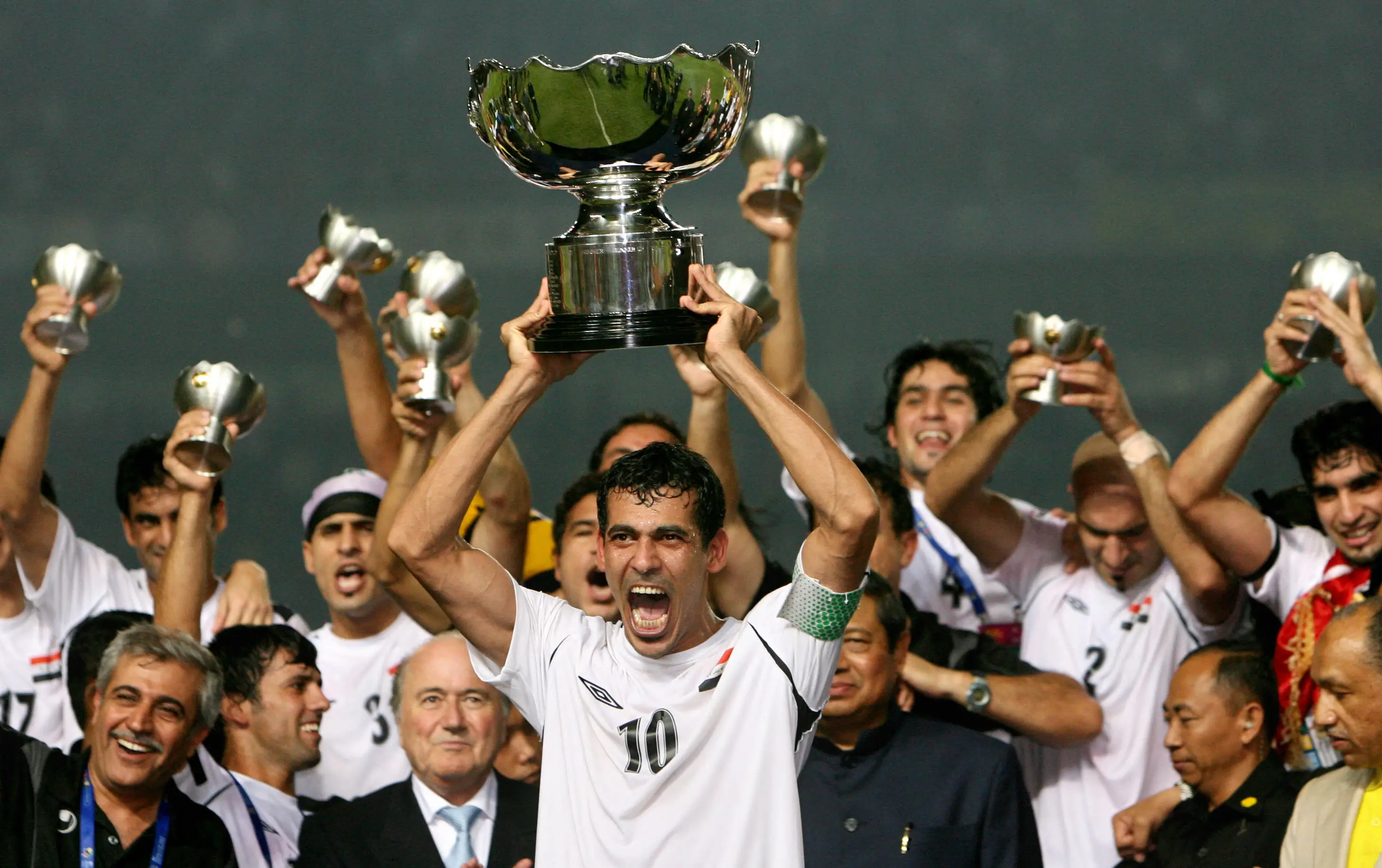 Iraq's captain Younis Mahmoud celebrates winning the Asian Cup in 2007. Image credit: Getty