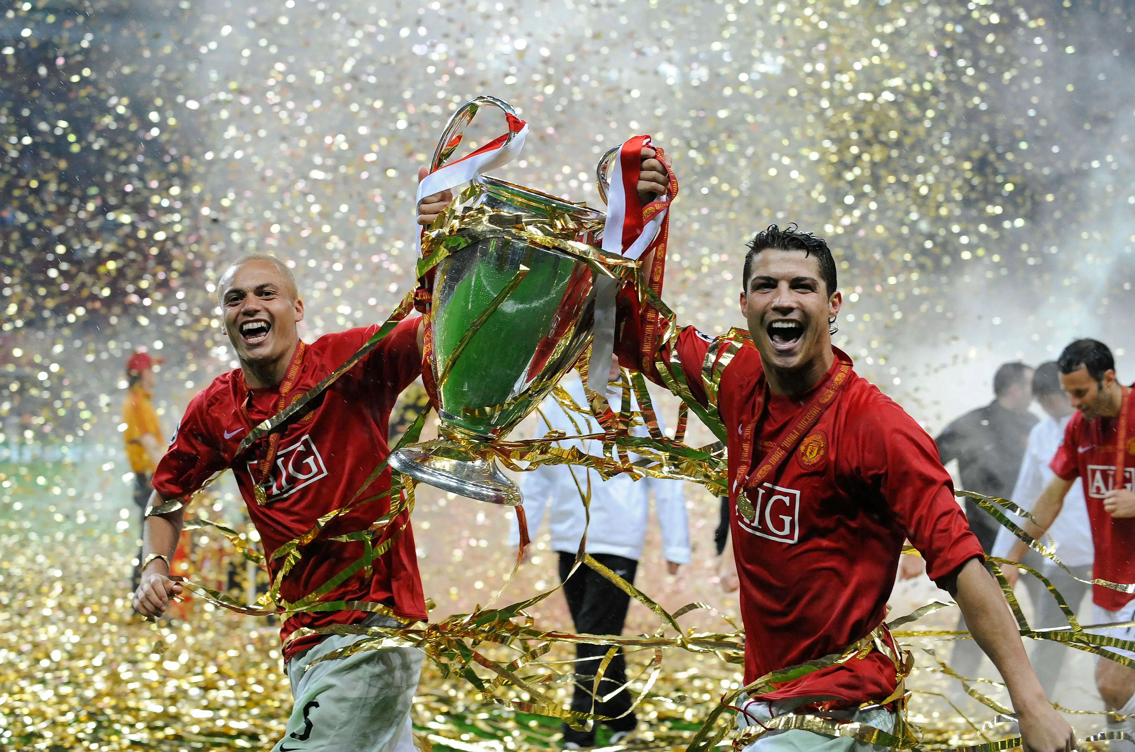 Wes Brown and Cristiano Ronaldo celebrate winning the Champions League. Image: Getty 