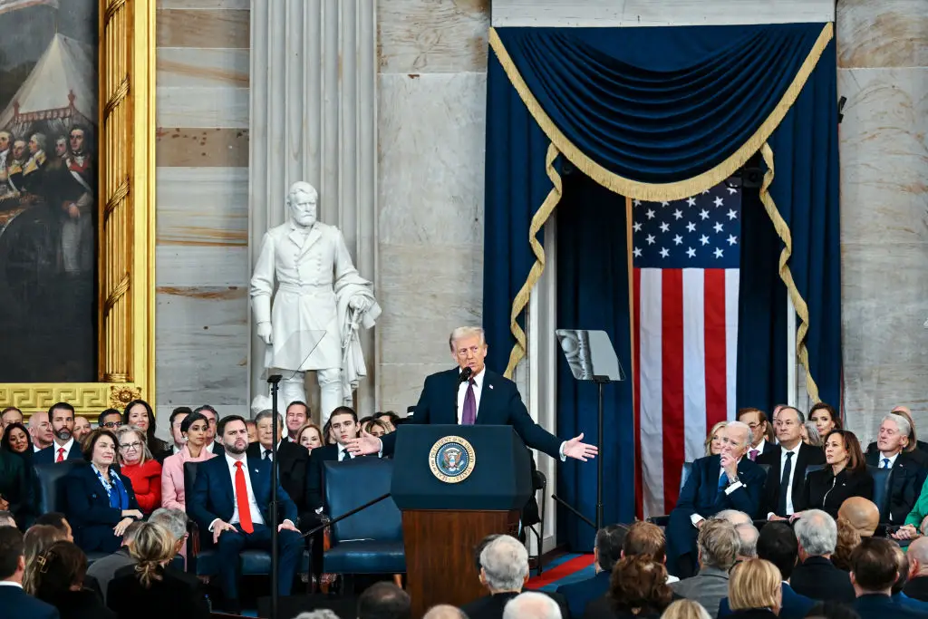 Kamala Harris listens to President Donald Trump as he speaks during his inauguration. Image credit: Getty