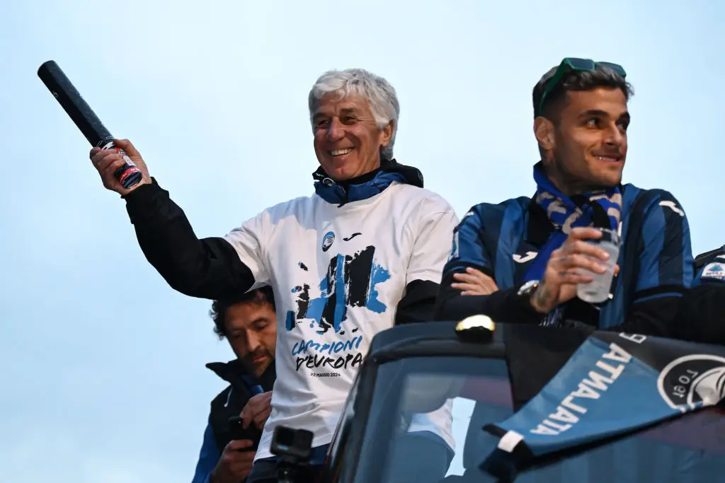 Gian Piero Gasperini celebrates on Atalanta's bus parade after winning the Europa League (