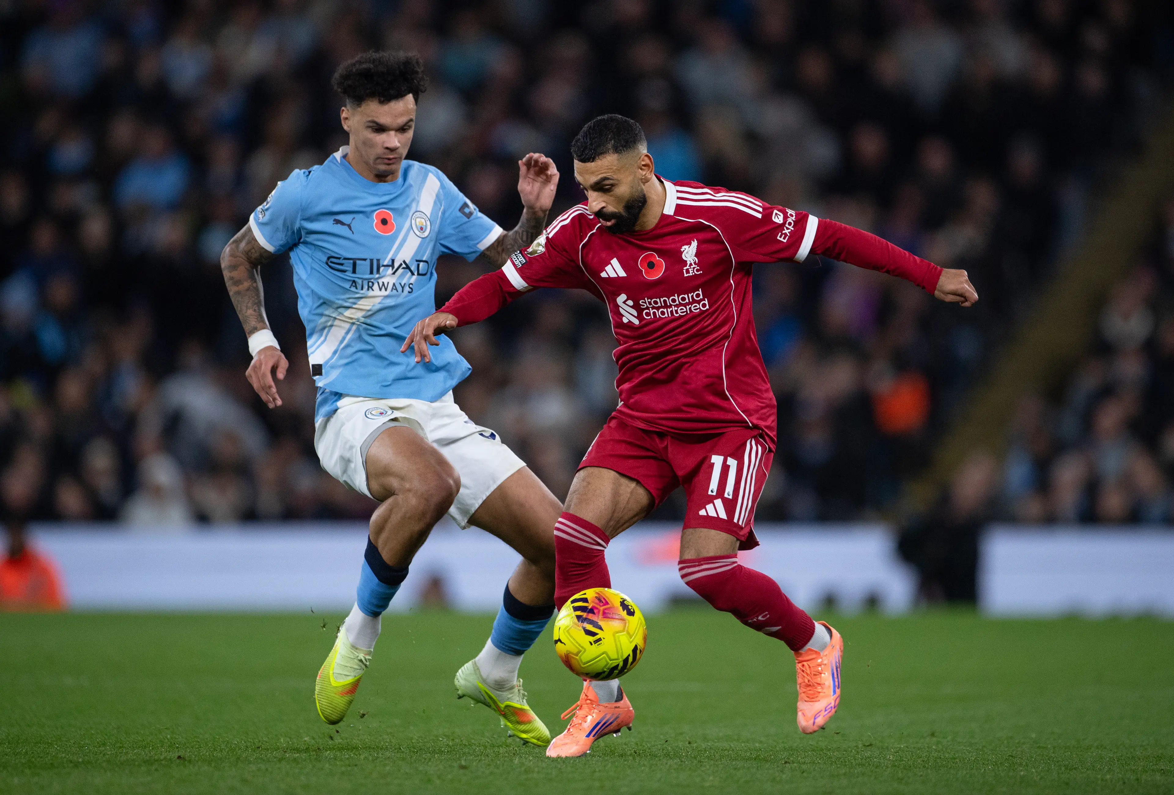 Nico O'Reilly and Mo Salah in action (credit: getty)