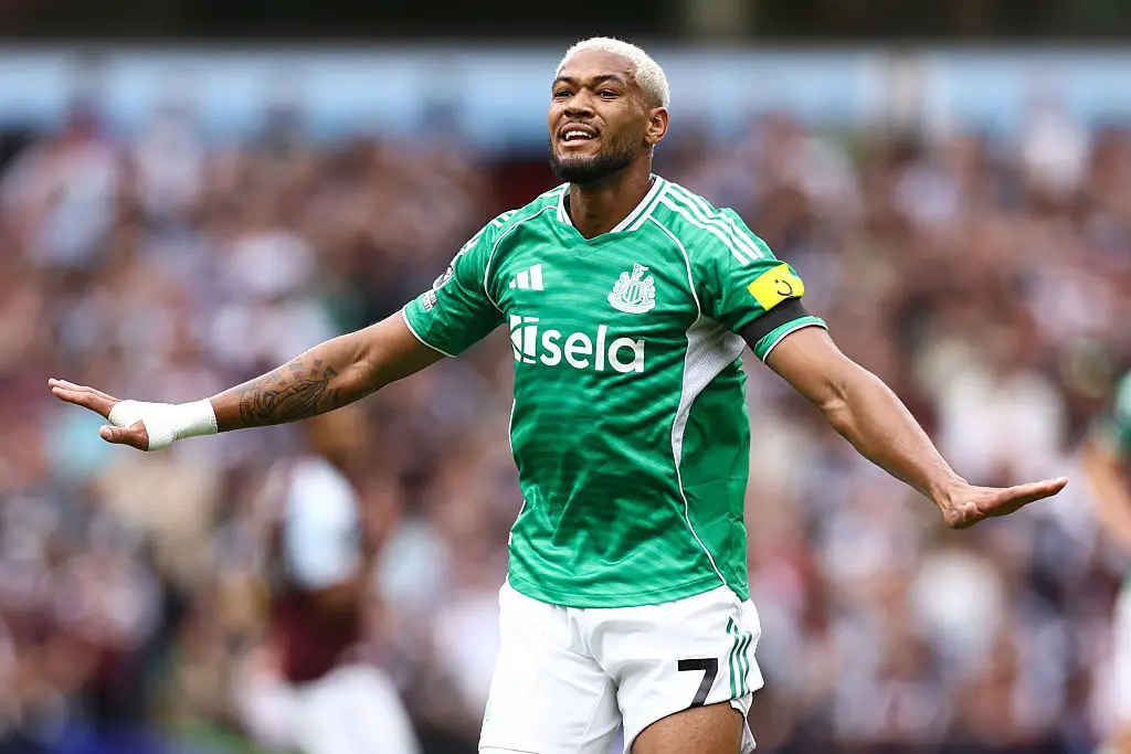 Joelinton appears to have responded to teammate Alexander Isak. (Image: Jacques Feeney/Offside/Offside via Getty Images)