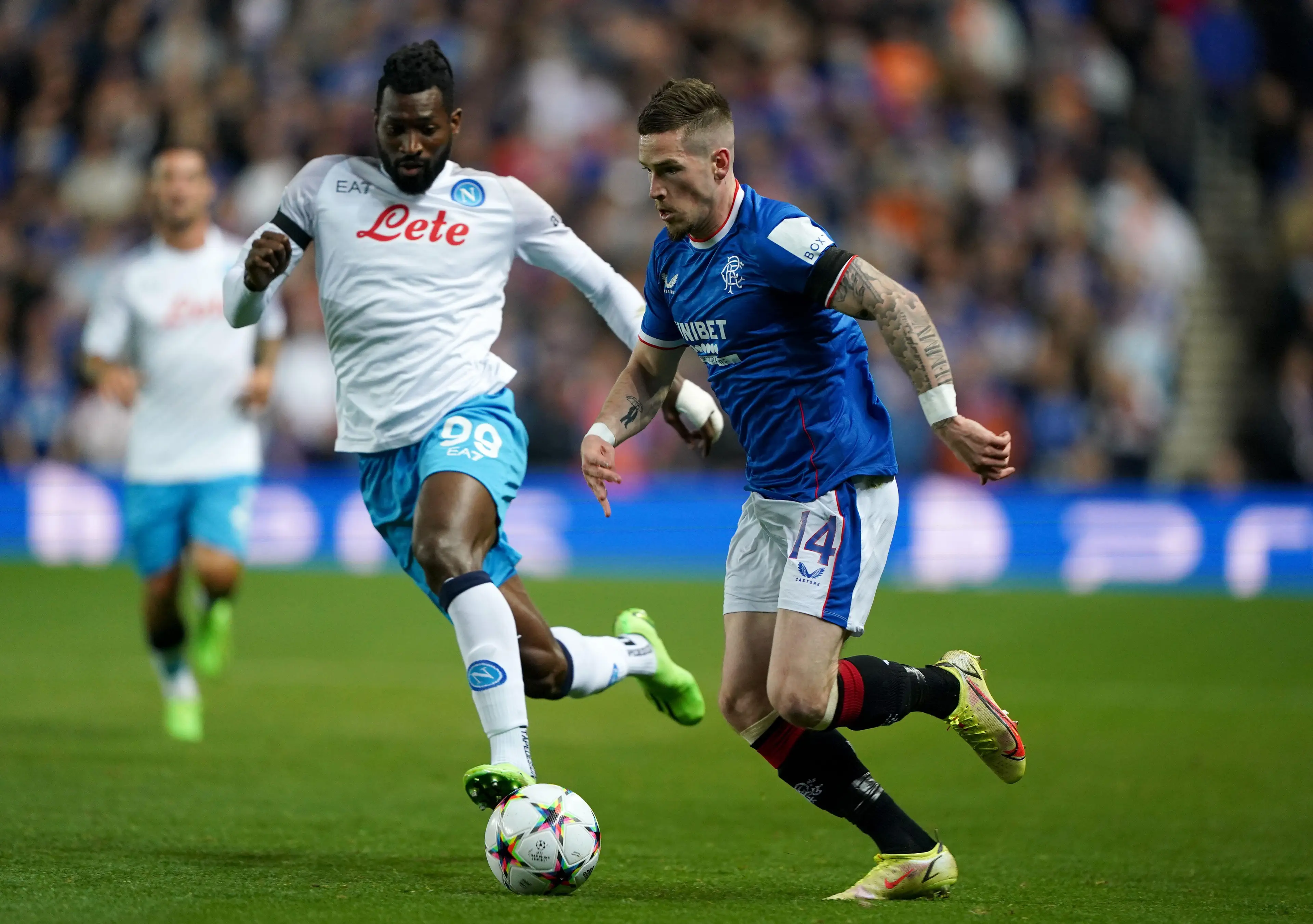 Ryan Kent takes on Andre-Frank Zambo Anguissa. (Image