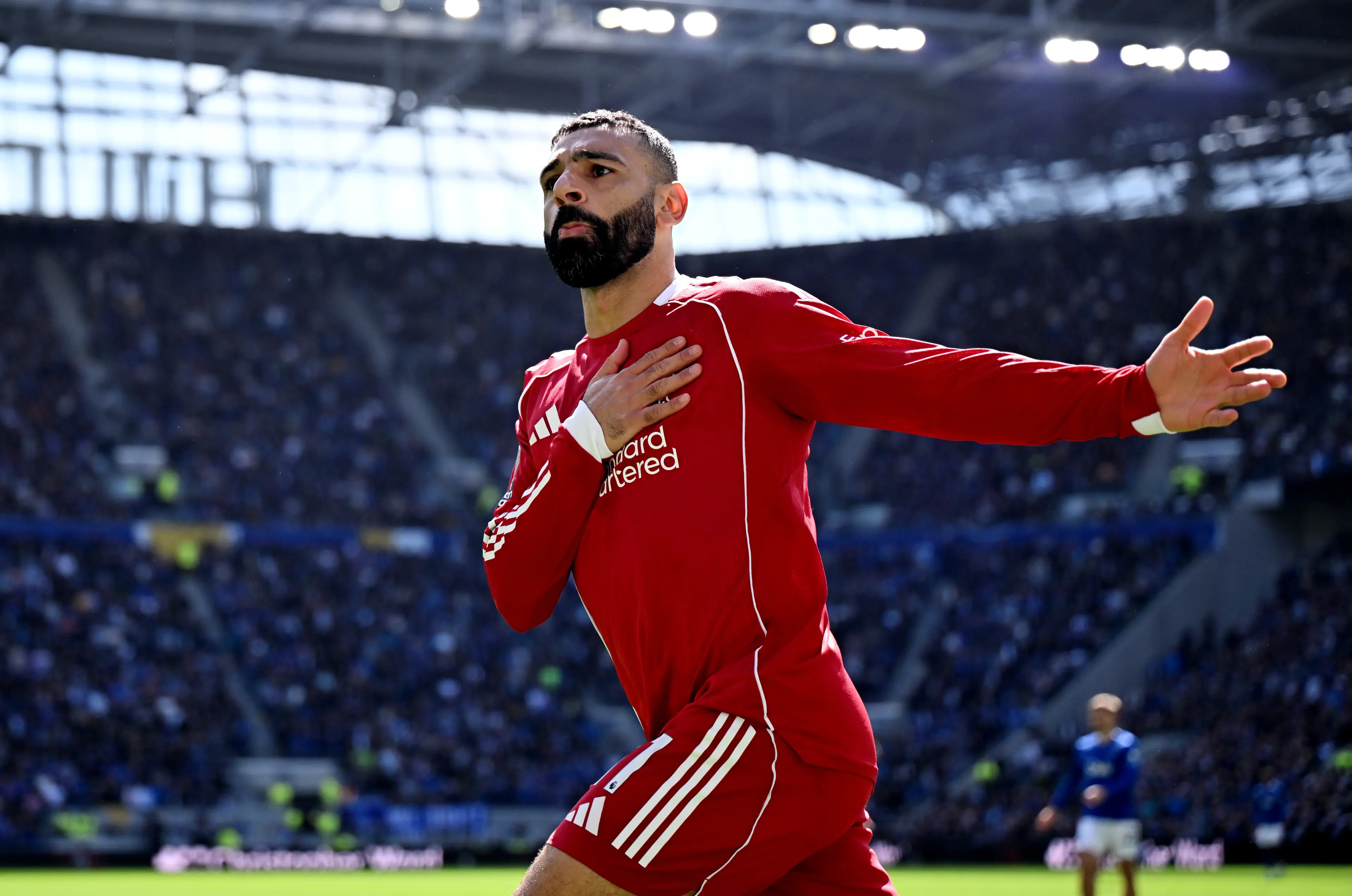 Mohamed Salah of Liverpool celebrates scoring his team's first goal during the Premier League match between Everton and Liverpool at Hill Dickinson Stadium 