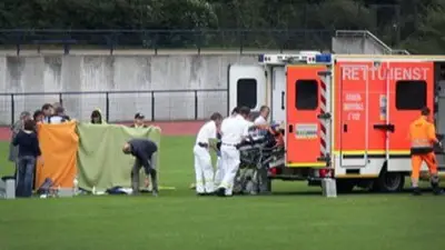 Medics attend the scene in Dusseldorf