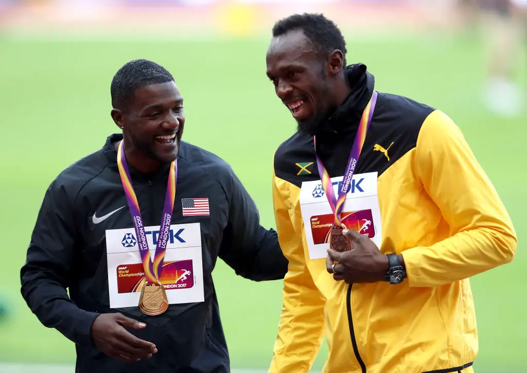 Usain Bolt and Justin Gatlin after the 2017 IAAF World Championships (Credit:Getty)
