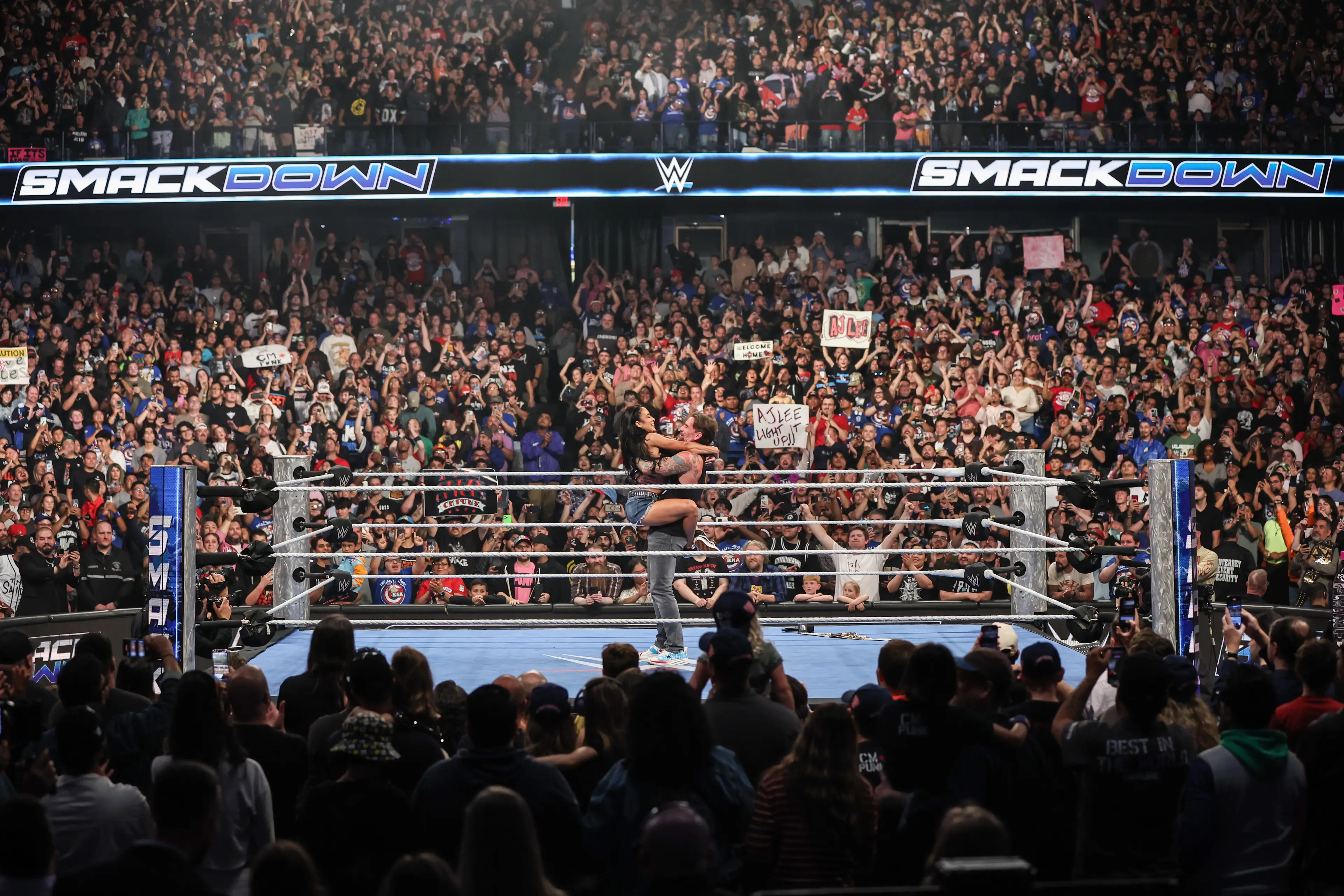 AJ Lee and CM Punk in the ring on WWE SmackDown. (Image: Getty)