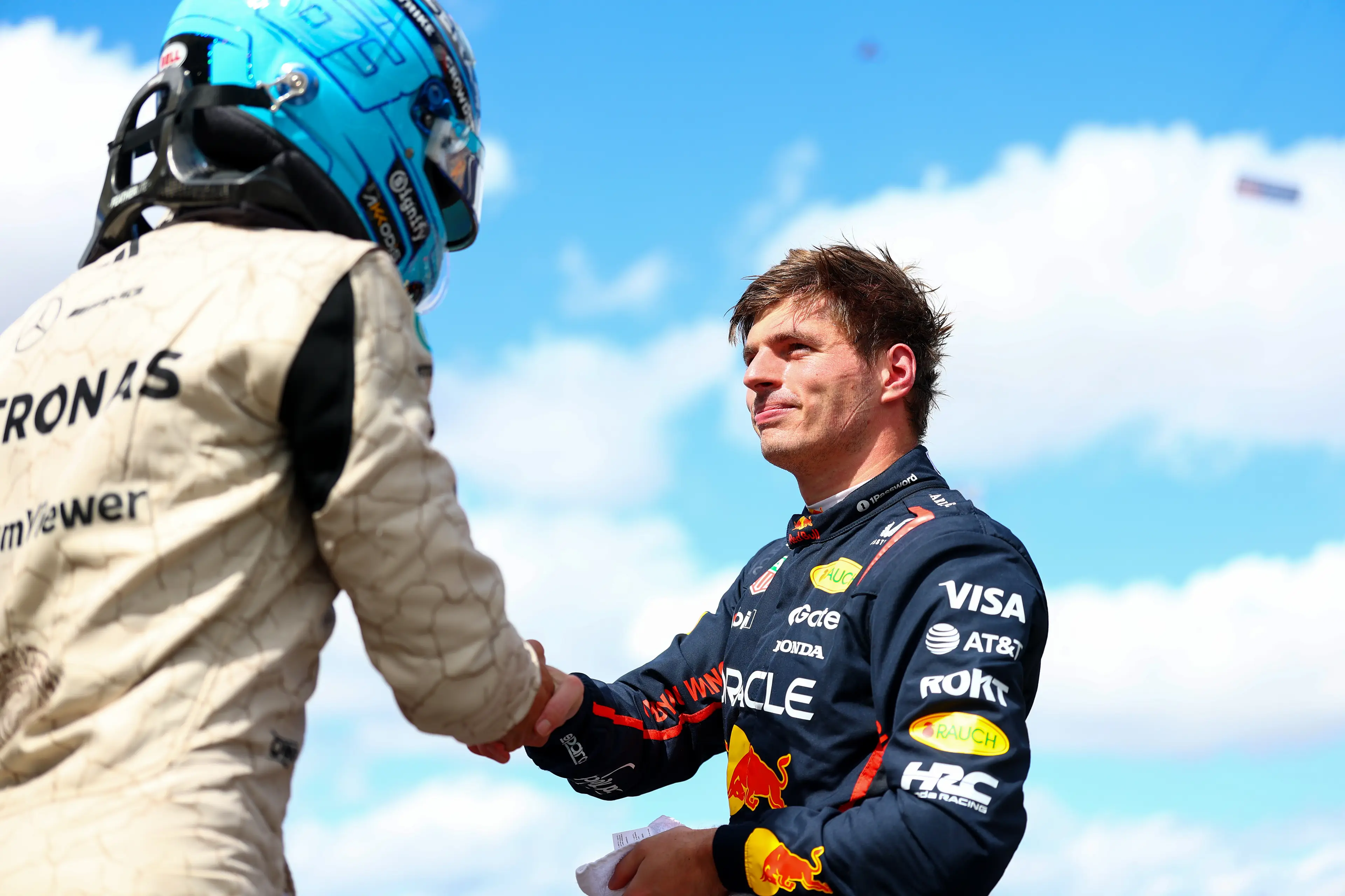 George Russell with Max Verstappen. Image: Getty