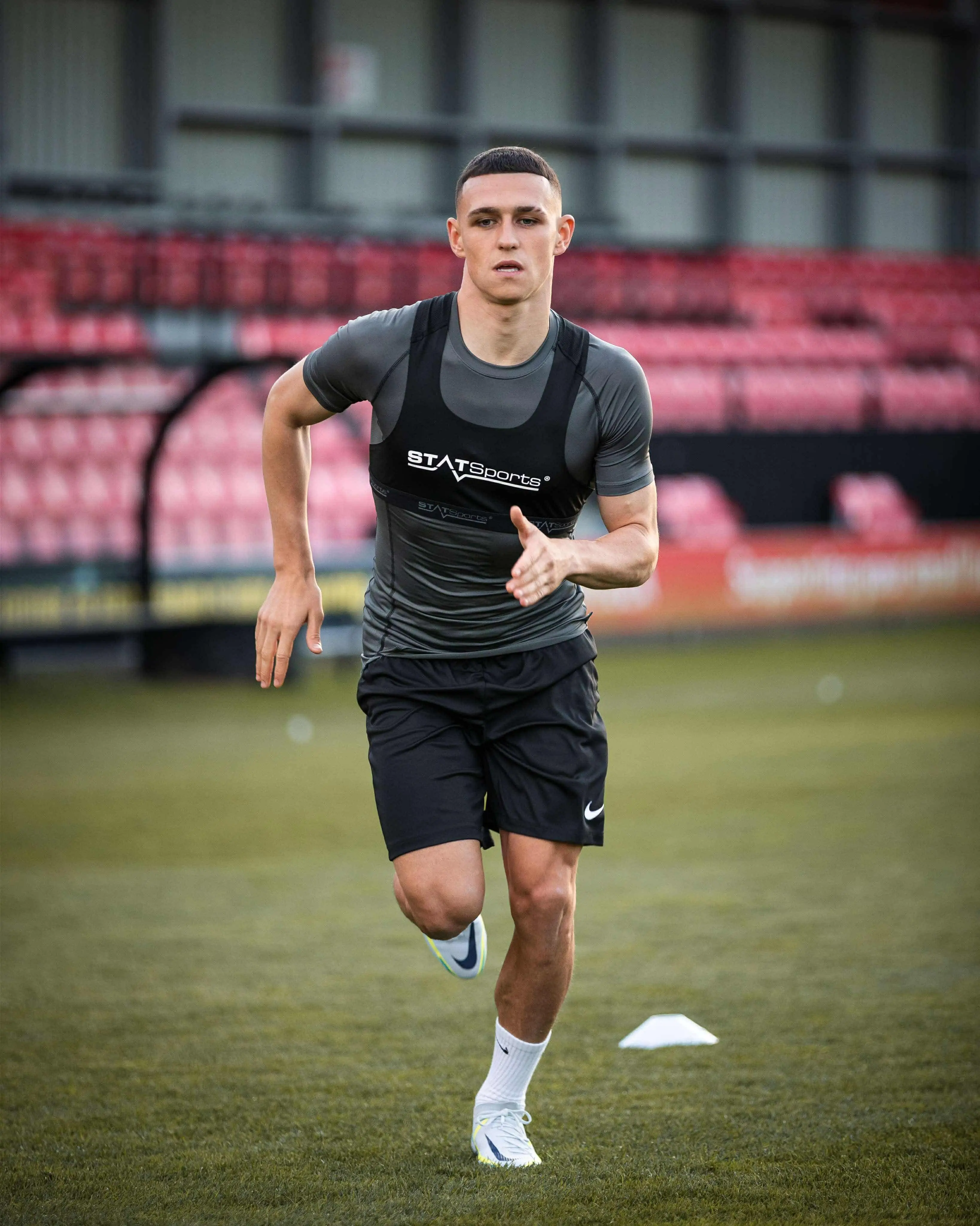Phil Foden trains wearing the STATSports vest. Image: STATSports