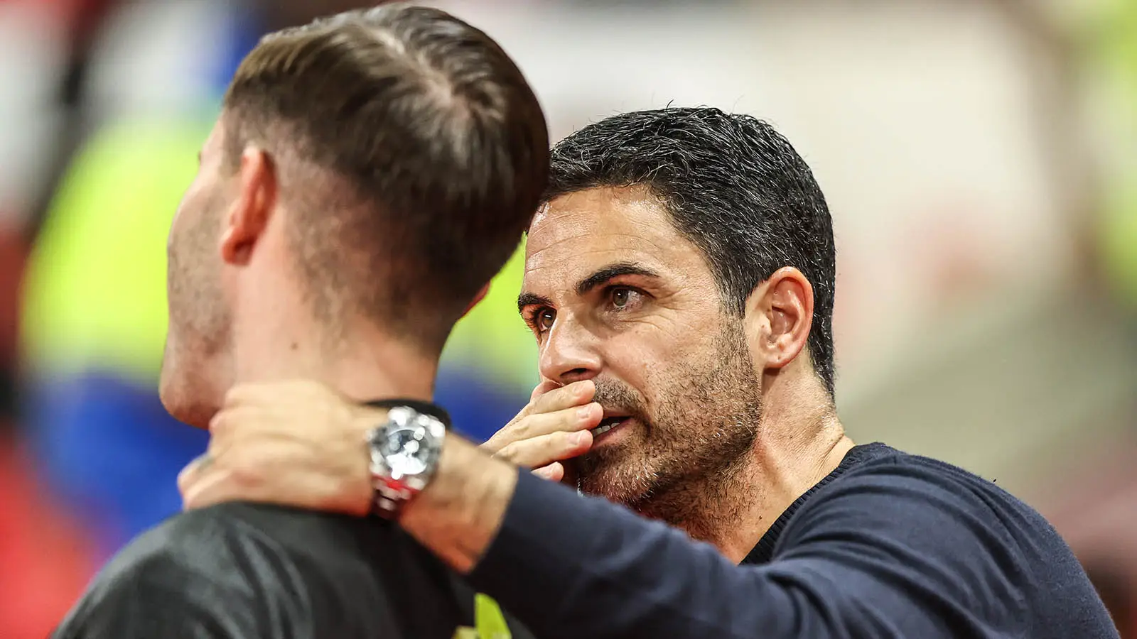 Mikel Arteta in conversation with an official during Arsenal's win over Sunderland (Image: Getty)