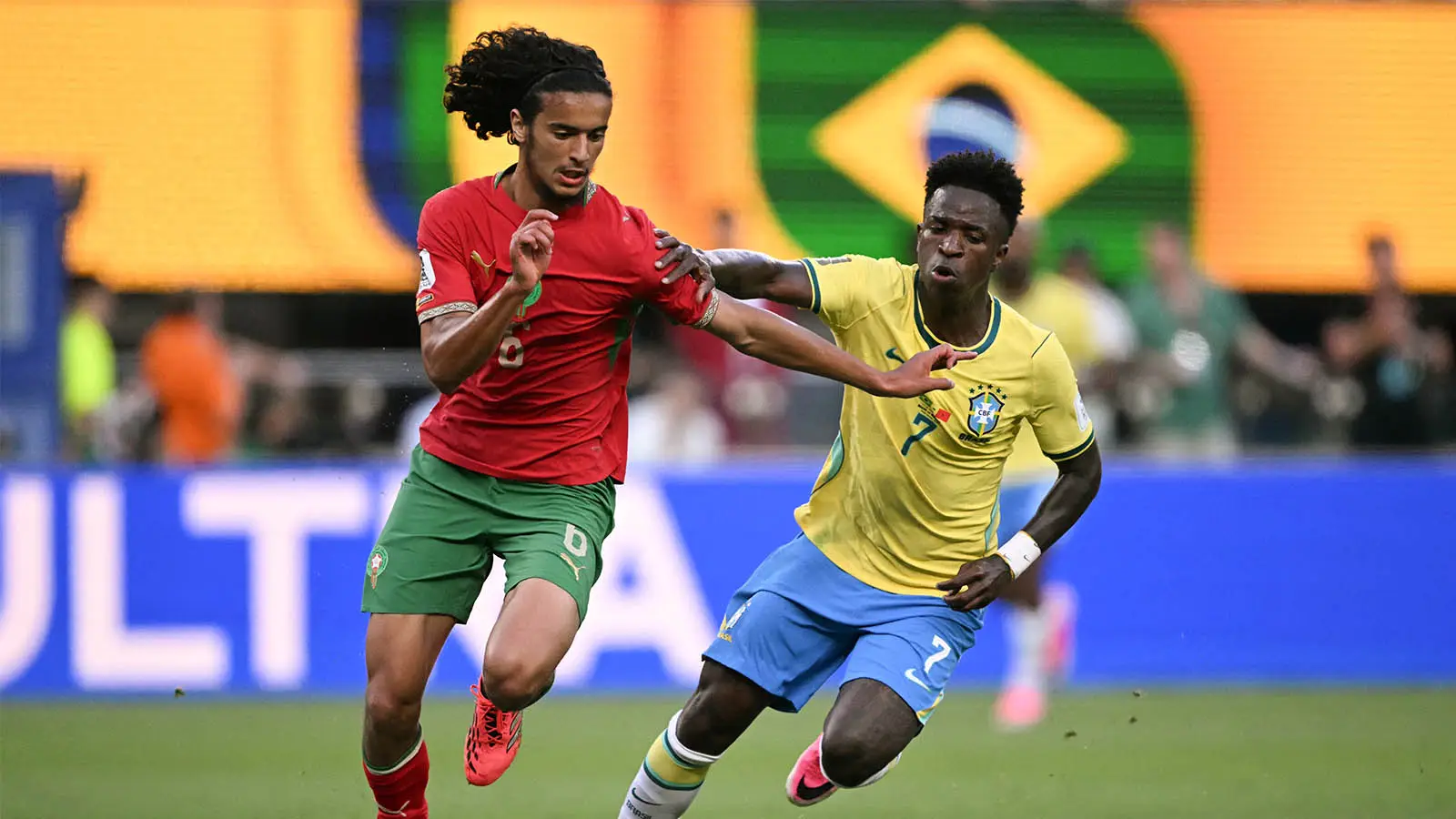 Bouaddi battles the ball with Vinicius Junior during Morocco's 1-1 draw with Brazil (Image: Getty)