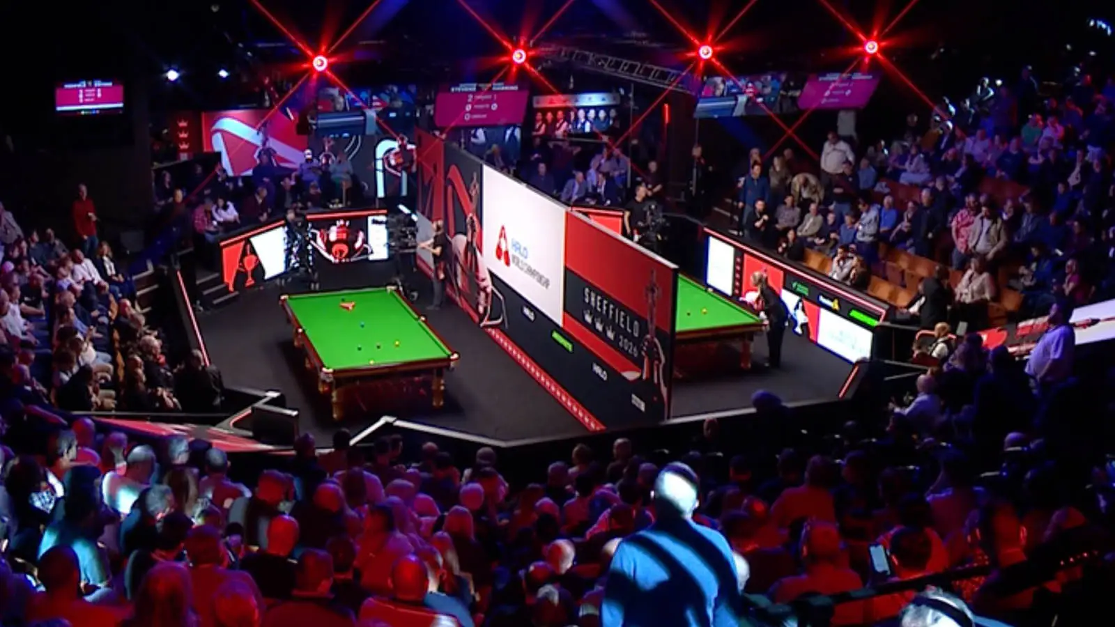 The carpet is in use around both tables at the Crucible (Image: BBC)