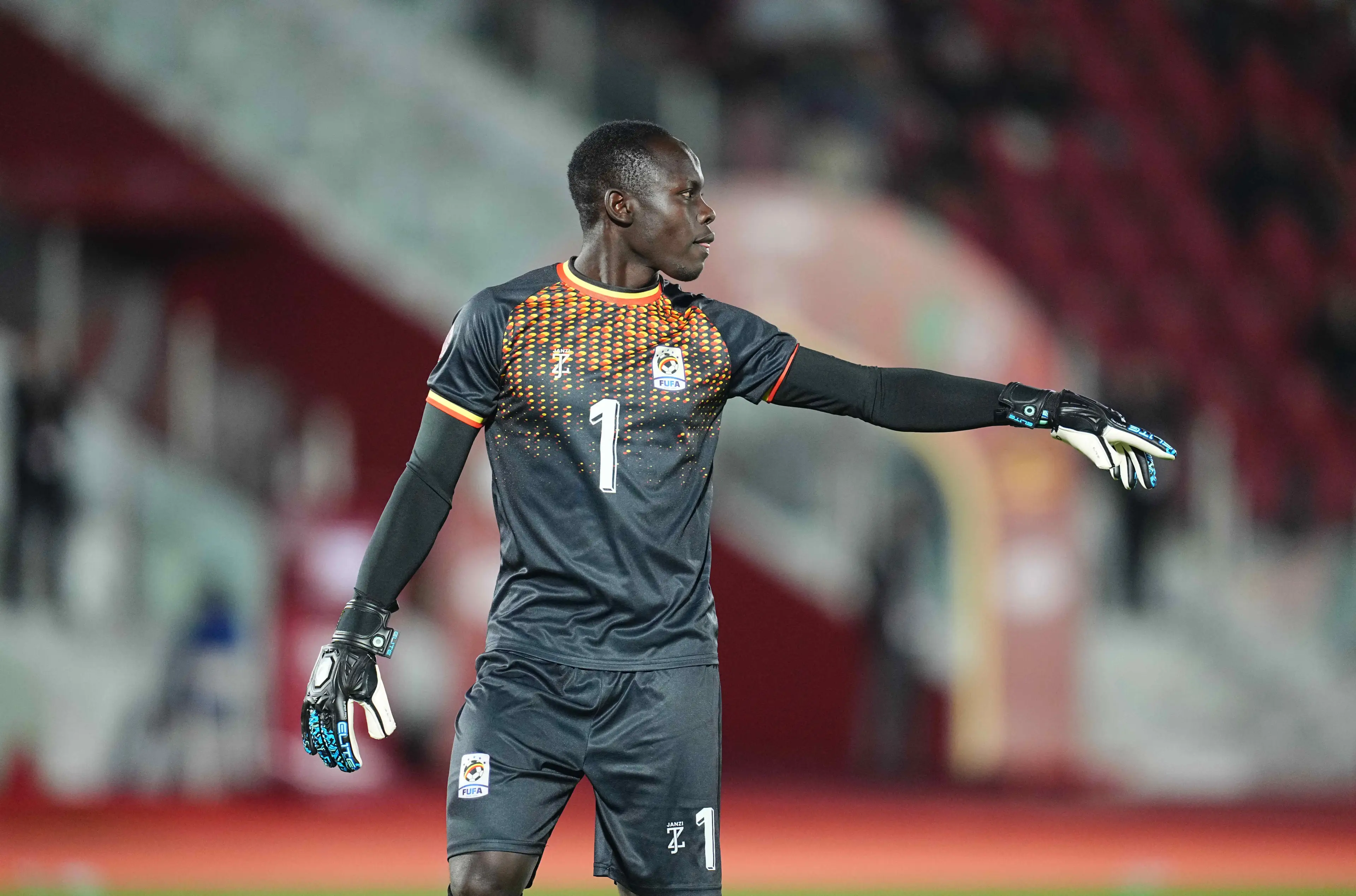 Uganda's third-choice goalkeeper Nafian Alionzi in action against Nigeria. Image: Getty 