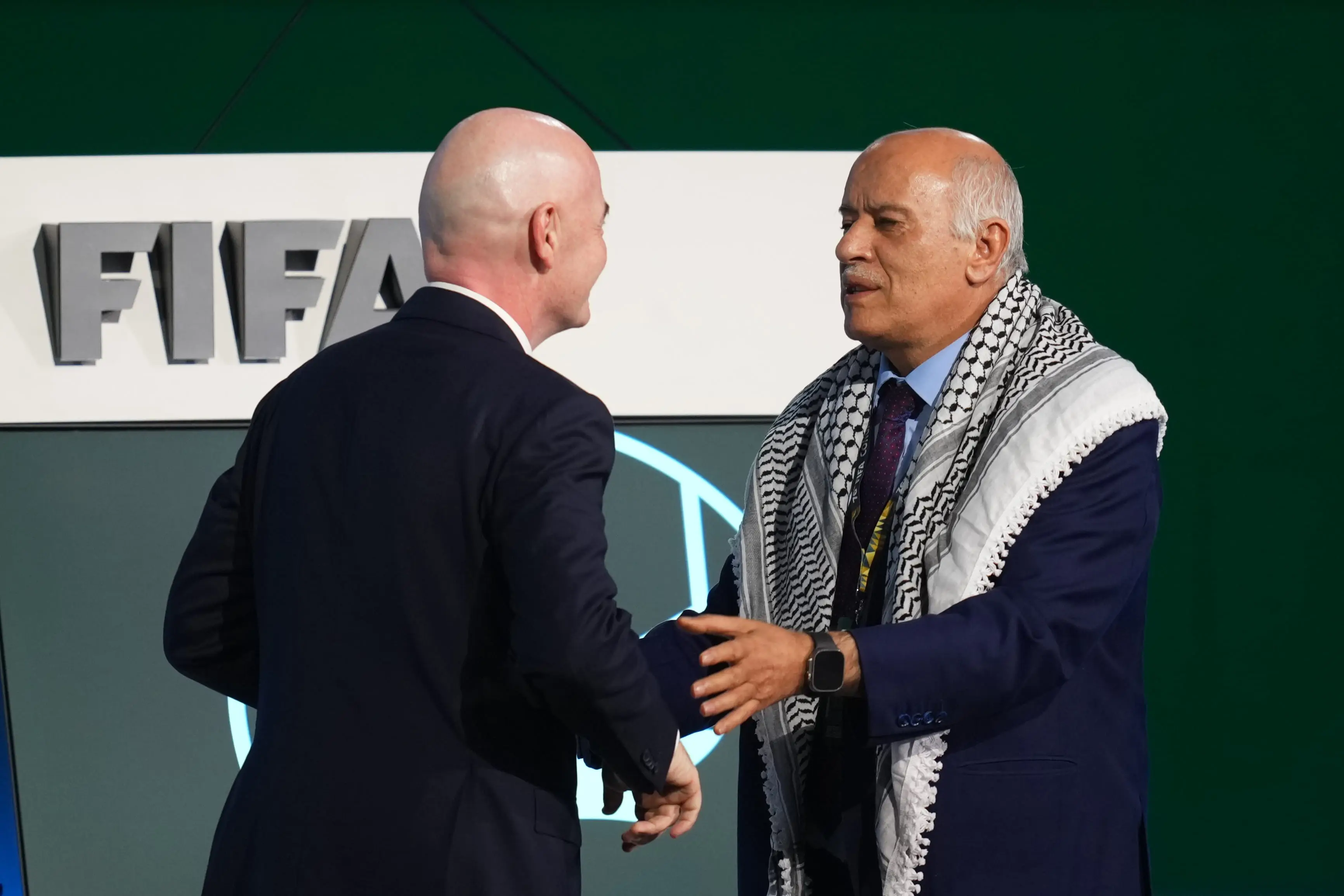 Infantino had an animated exchange with Palestine FA president Jibril Rajoub (Image: Getty)