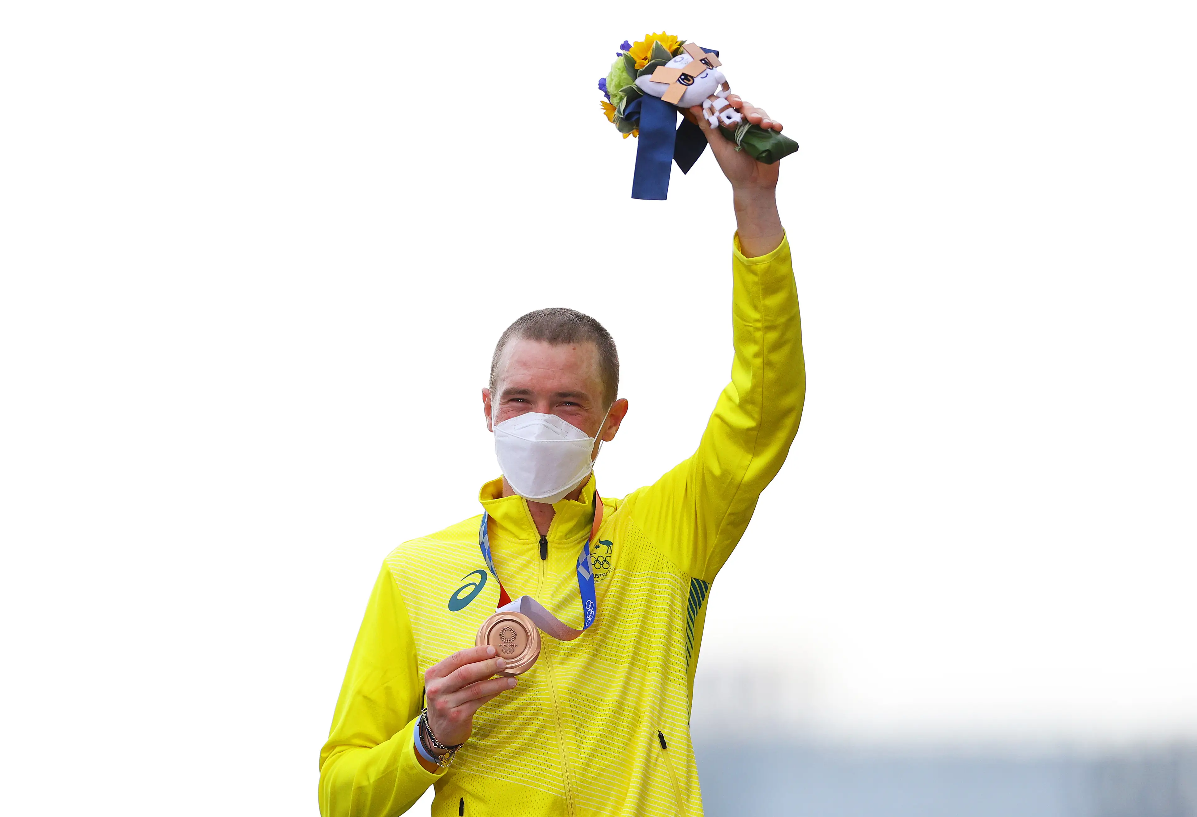 Rohan Dennis on the Olympic podium in Tokyo (credit: getty)