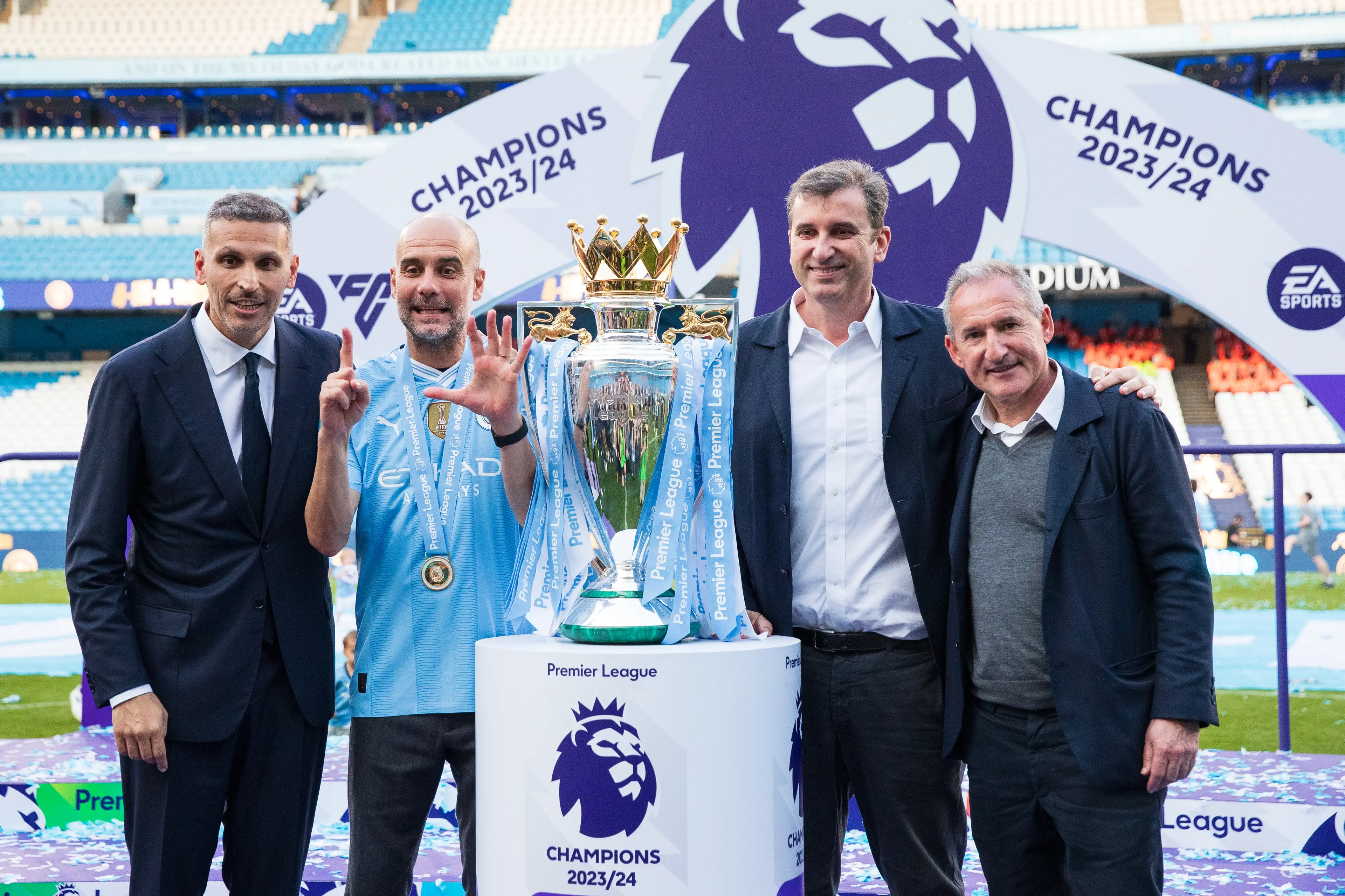 Manchester City chiefs Khaldoon Al Mubarak, Ferran Soriano, and Txiki Begiristain celebrate with Pep Guardiola after winning the league title in 2024. Image: Getty