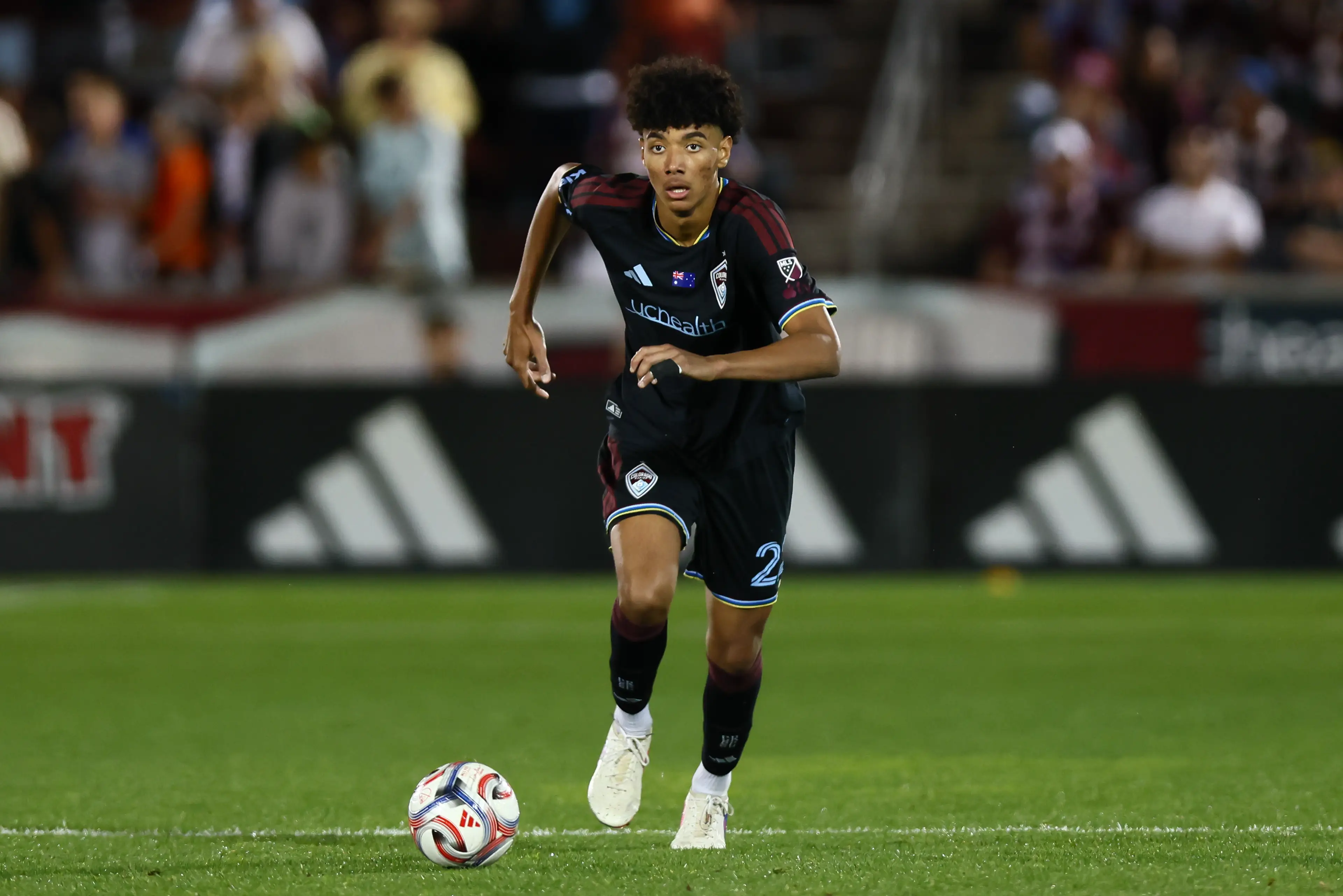 Lucas Herrington #22 of the Colorado Rapids dribbles the ball up the field during the second half against FC Dallas (Getty Images)