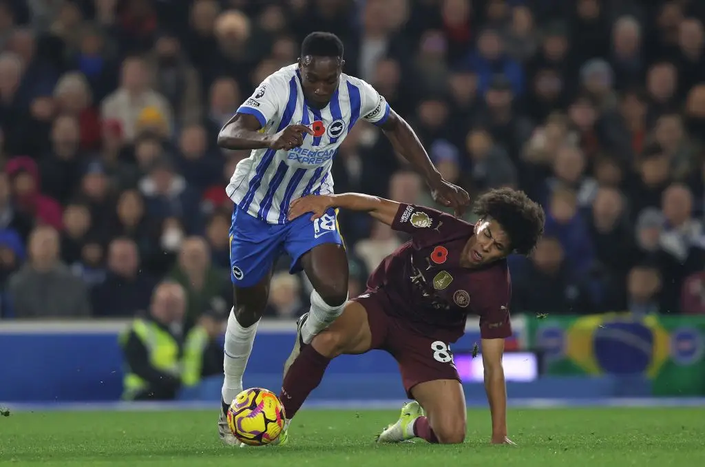 Rico Lewis in action for Man City against Brighton - Getty