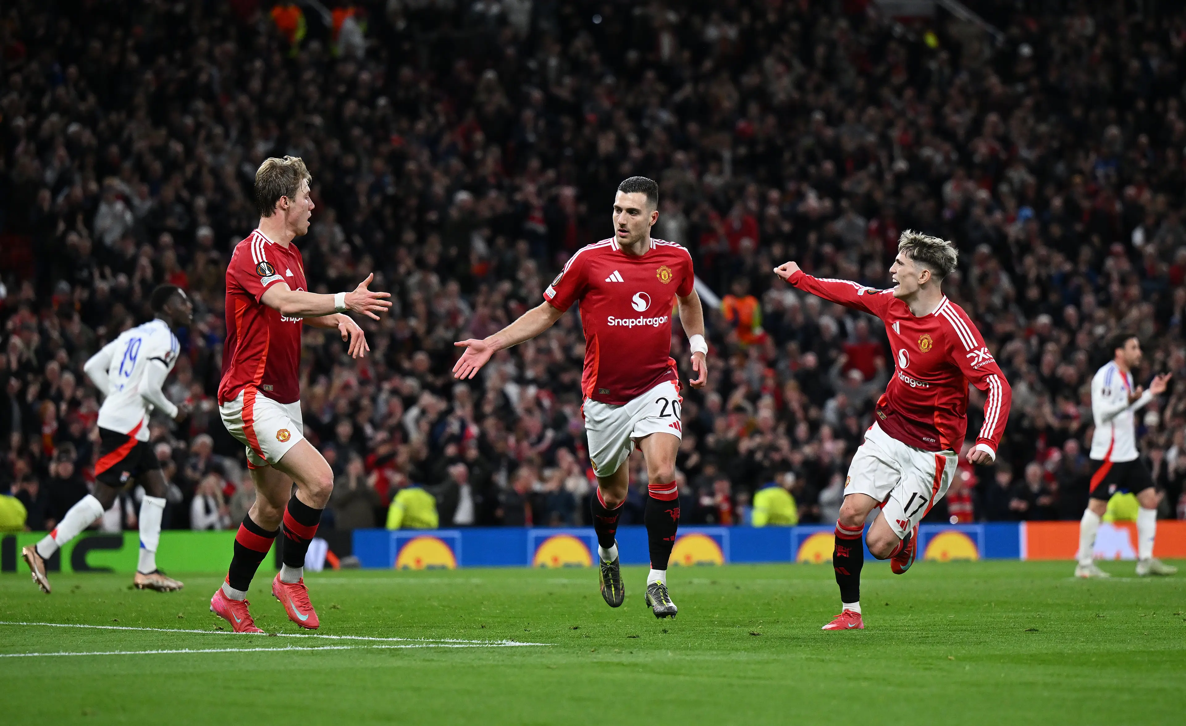 Rasmus Hojlund and Alejandro Garnacho celebrate Diogo Dalot's goal. Image: Getty