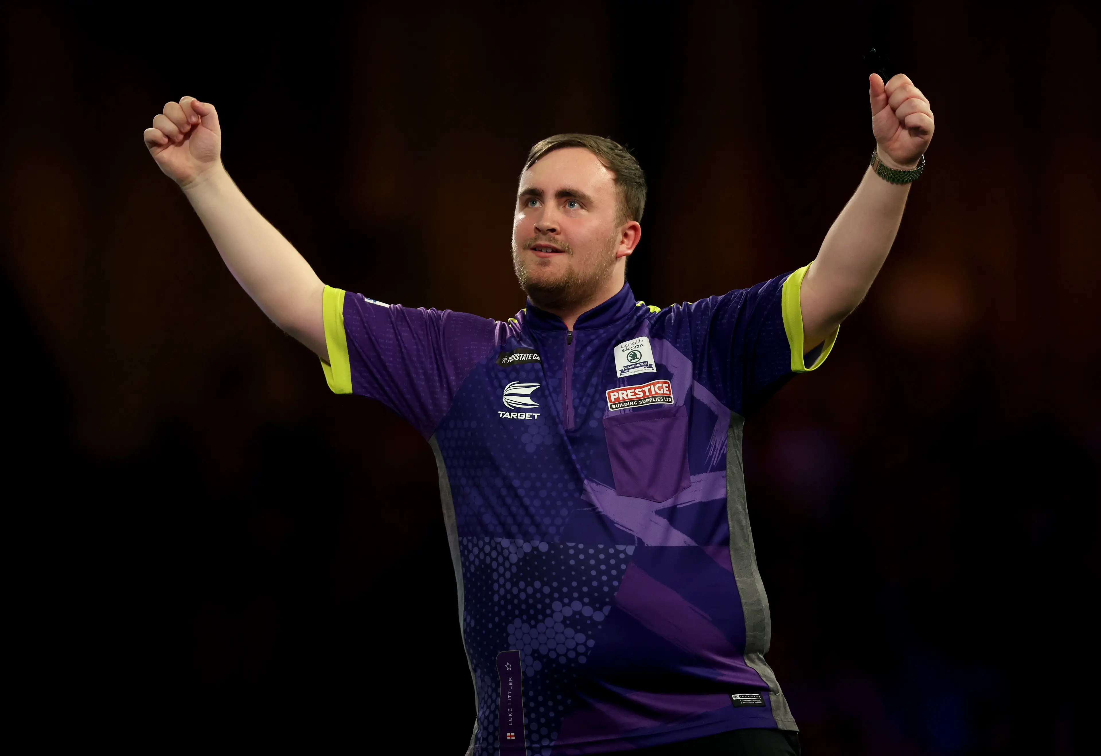 Luke Littler celebrates after beating Rob Cross. Image: Getty 