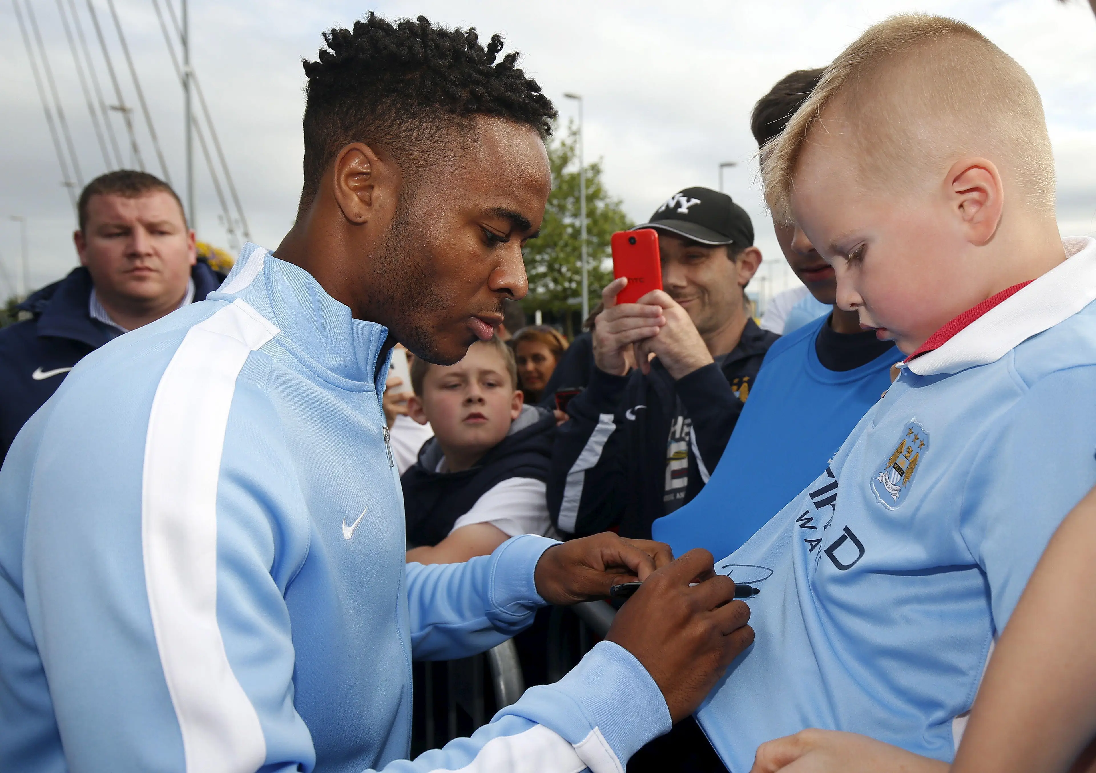 Raheem Sterling signing for Man City in 2015 (REUTERS / Alamy)
