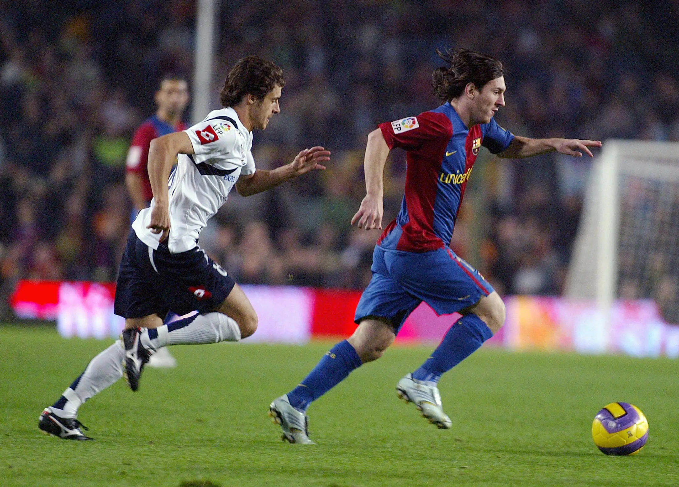 Lionel Messi and Pablo Aimar during a La Liga fixture. Image: Getty 